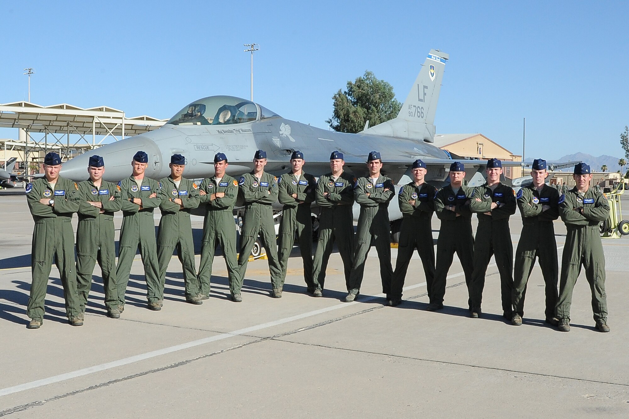 The 309th Fighter Squadron graduates 14 pilots today. They are, from left, 1st Lts. Joseph Anderson, Scott Morris, Keith Eidsness, Ian Lee, Christopher Prochnow, Christopher Garner, Jeffrey Brandon, Matthew Wetherbee, Stowe Symon, Austin Baker, Andrew Bolint, Joshua Tempel, Sean O’Donnell and Benjamin Ausbun.