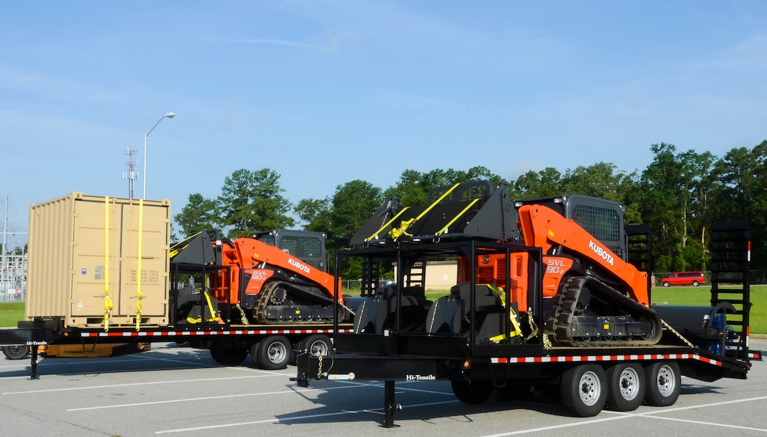 Two route clearance kits assigned to the 116th Civil Engineer Squadron, Georgia Air National Guard, arrive for service at Robins Air Force Base, Ga., June 27, 2013.  The civil engineering arm of the 116th Air Control Wing will use the kits, consisting of multi-purpose Kubota tractors, when called upon to quickly respond to disasters in their region.  The equipment gives the unit the capability to clear debris in the area of a disaster so emergency operations personnel can respond. (U.S. Air National Guard photo by Capt. Pamela Stauffer/Released)