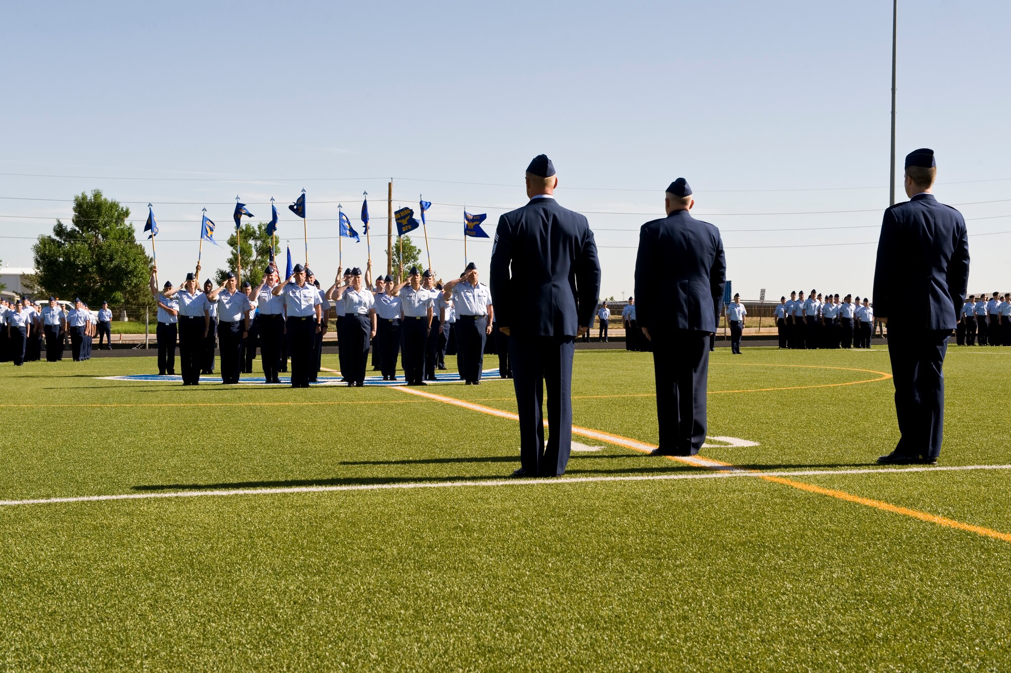 The group and squadron commanders of the 460th Space Wing salute Col. Dan A. Dant, former 460th SW commander, June 28, 2013, during the 460th SW change of command ceremony on Buckley Air Force Base, Colo. This was Dant’s final salute before he relinquished command of the wing. (U.S. Air Force photo by Senior Airman Phillip Houk/Released)