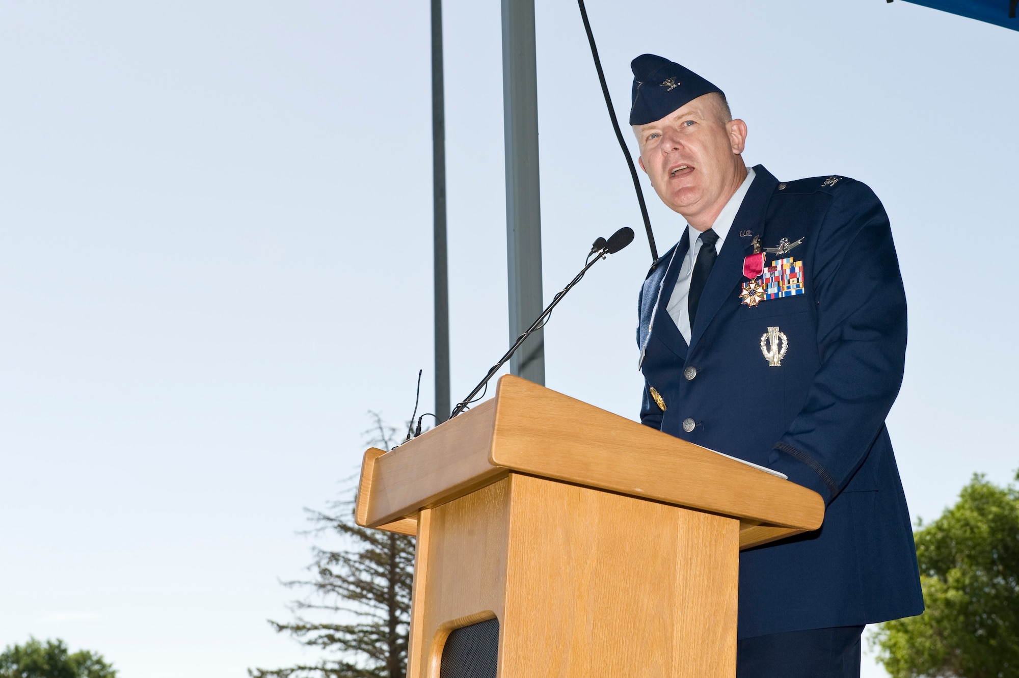 Col. Dan A. Dant, former 460th Space Wing commander, says goodbye to members of 460th SW June 28, 2013, during the 460th SW change of command ceremony on Buckley Air Force Base, Colo. During his speech, Dant said he honored his time with the men and women of the 460th SW, thanking them for their hard work to make Buckley the premier base in Air Force Space Command. (U.S. Air Force photo by Senior Airman Phillip Houk/Released)