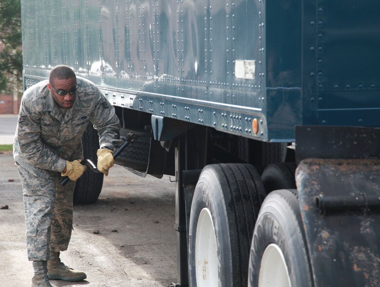 Staff Sgt. Rick Riley, 911th Logistics Readiness Squadron vehicle operator, raises the landing gear of a semi-trailer, June 2, 2013, at the Pittsburgh International Airport Air Reserve Station. (U.S. Air Force photo by Senior Airman Jonathan Hehnly)
