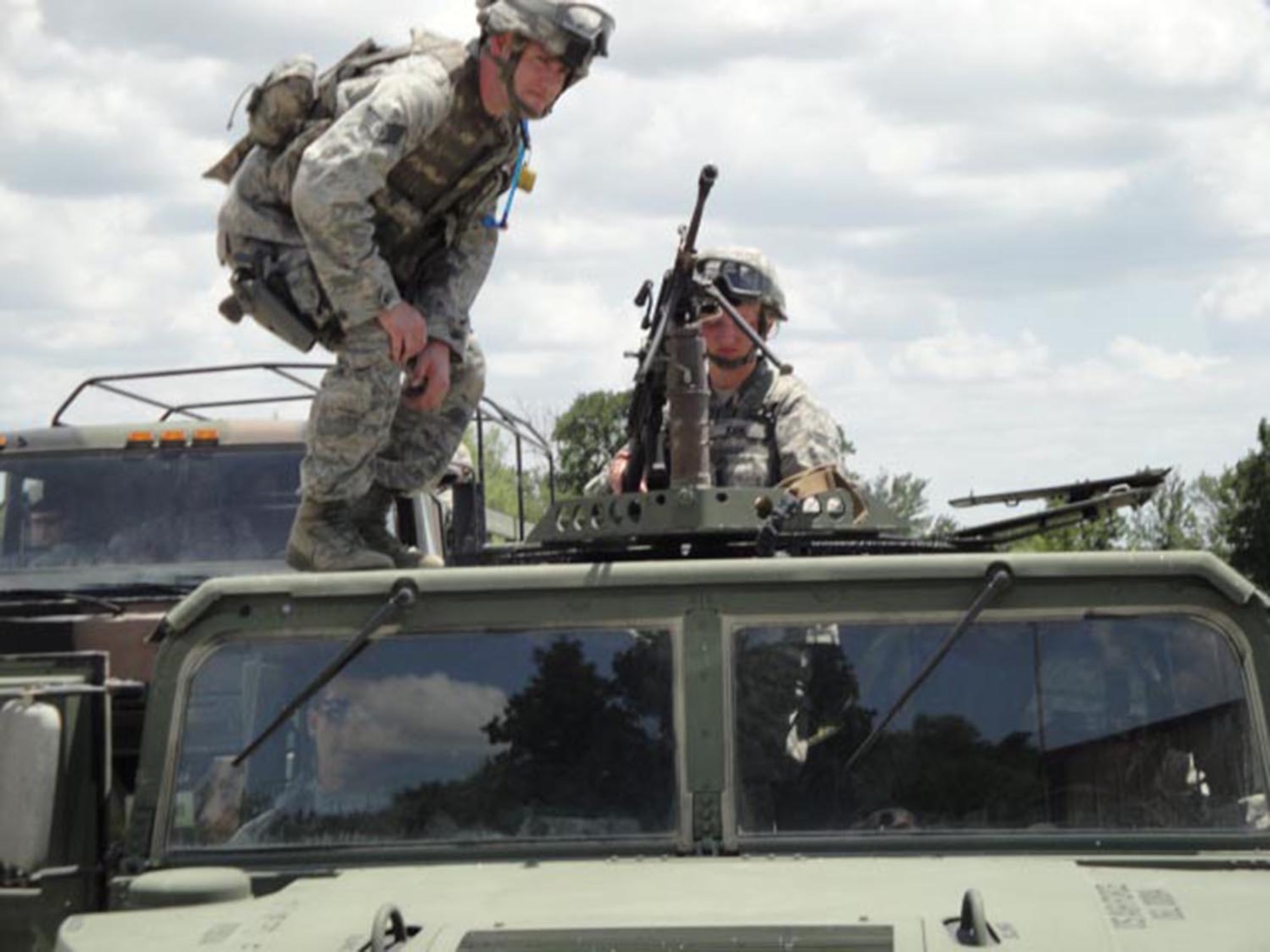 Staff Sgt. Joseph Stott, left,  and Airman 1st Class Chessie Kirk,  prepared to go out on a mounted patrol mission during Patriot Defender training at Fort Wolters, Texas June 8-23.  Stott and Kirk are Air Force Reservists with the 446th Security Forces Squadron, Joint Base Lewis-McChord, Wash. (Courtesy photo)