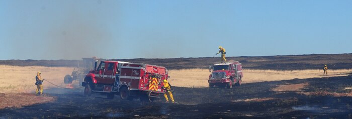 Beale firefighters battle a prescribed burn at Beale Air Force Base Calif., June 27, 2013. Beale firefighters are on call 24/7 to respond to incidents in the local area. (U.S. Air Force photo by Airman 1st Class Bobby Cummings/Released)