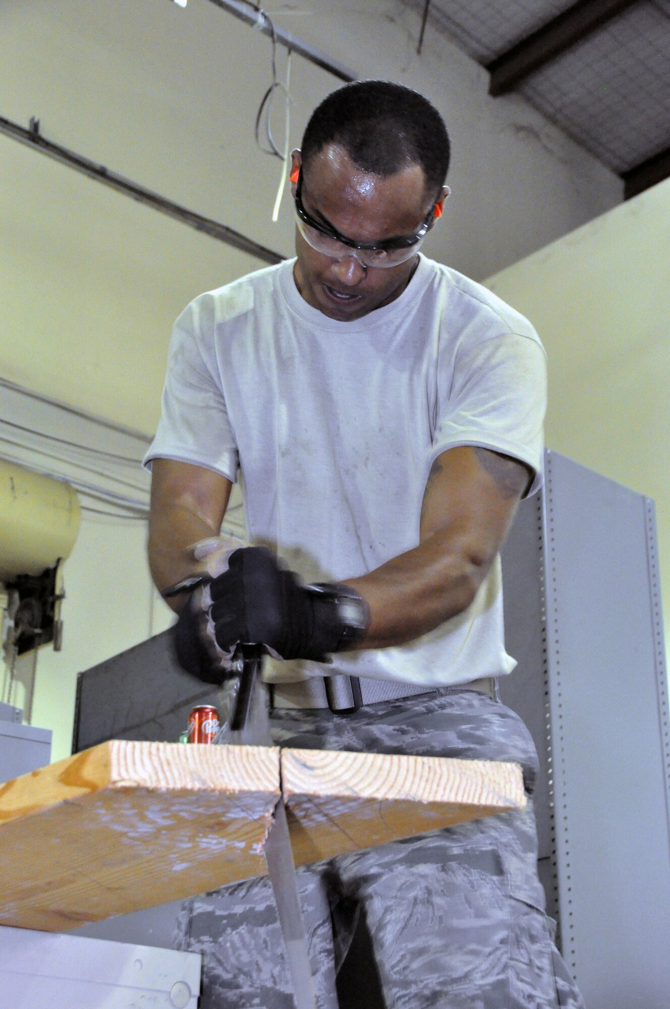 Senior Airman William Shelden, 442nd Civil Engineer Squadron structures technician, crafts risers for stairs during annual tour training June 18, 2013. Members of the 442nd CES train regularly in skills they will use while deployed. The 442nd CES is part of the 442nd Fighter Wing, an A-10 Thunderbolt II Air Force Reserve unit at Whiteman Air Force Base, Mo. (U.S. Air Force photo by Senior Airman Wesley Wright/Released)