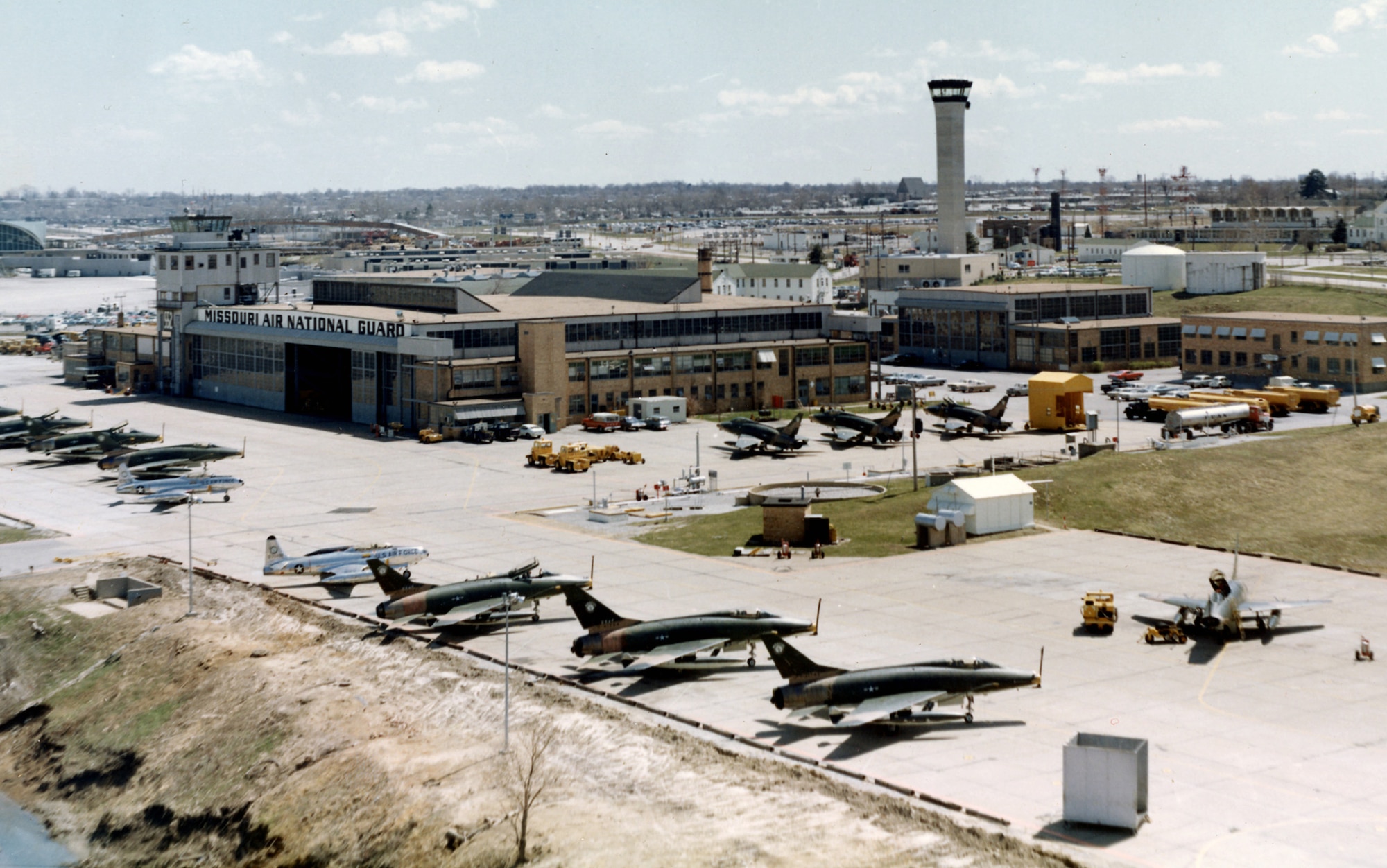 Republic F-84F “Thunderstreaks” and North American F-100C “Super Sabres” of the 131st Light Bombardment Wing, Missouri Air National Guard,  parked at Robertson Field, Saint Louis, 1962.  (131st Bomb Wing file photo/RELEASED)