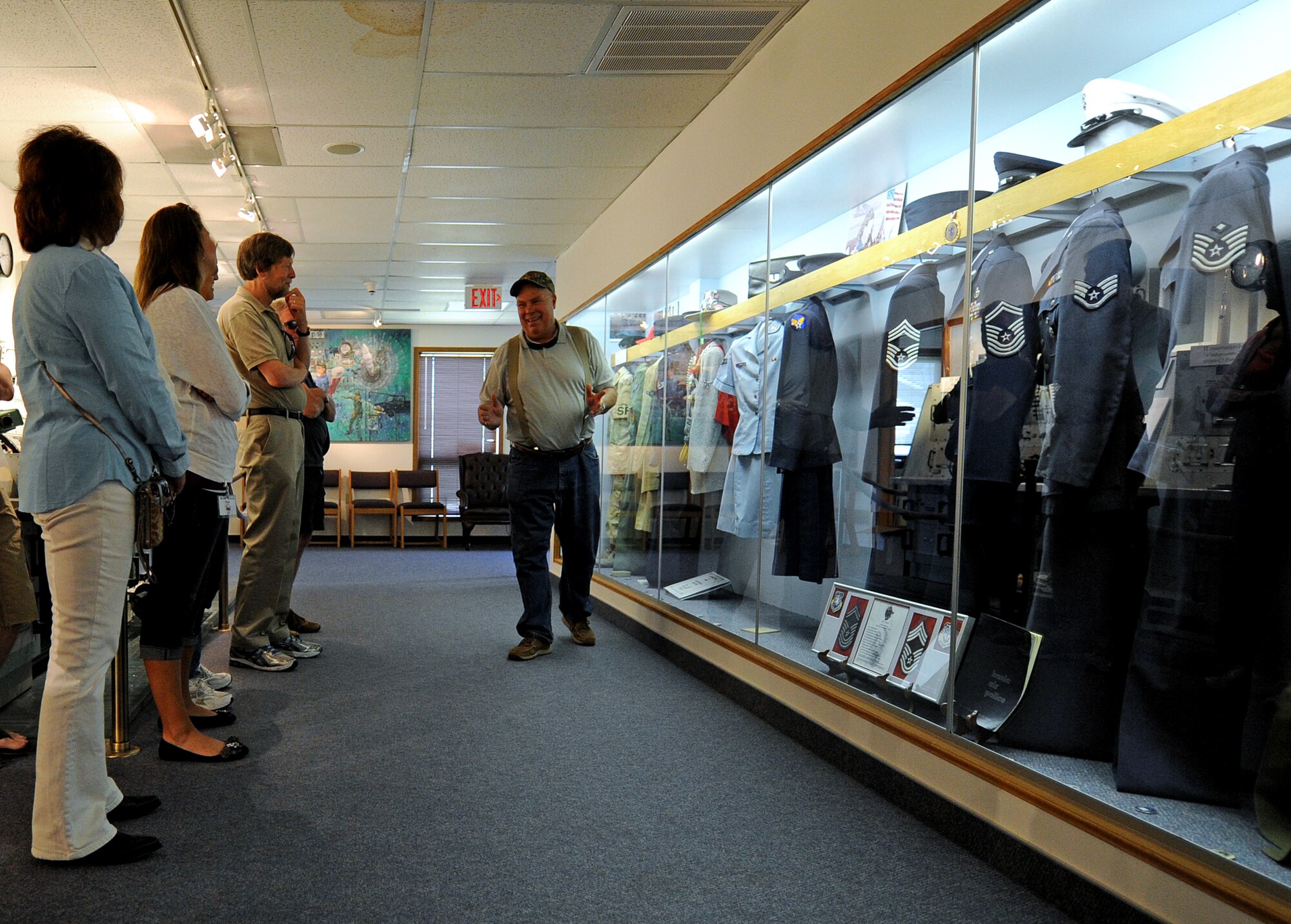 Curt Shannon, Malmstrom Air Force Base Museum director, discusses the evolution of the Air Force dress uniform during a museum tour June 18 for more than 35 Great Falls, Bozeman, and Helena, Mont., kindergarten to 12th grade teachers. The tour was part of a three-year grant program to help instructors gain professional development in American history education. (U.S. Air Force photo/Staff Sgt. R.J. Biermann)