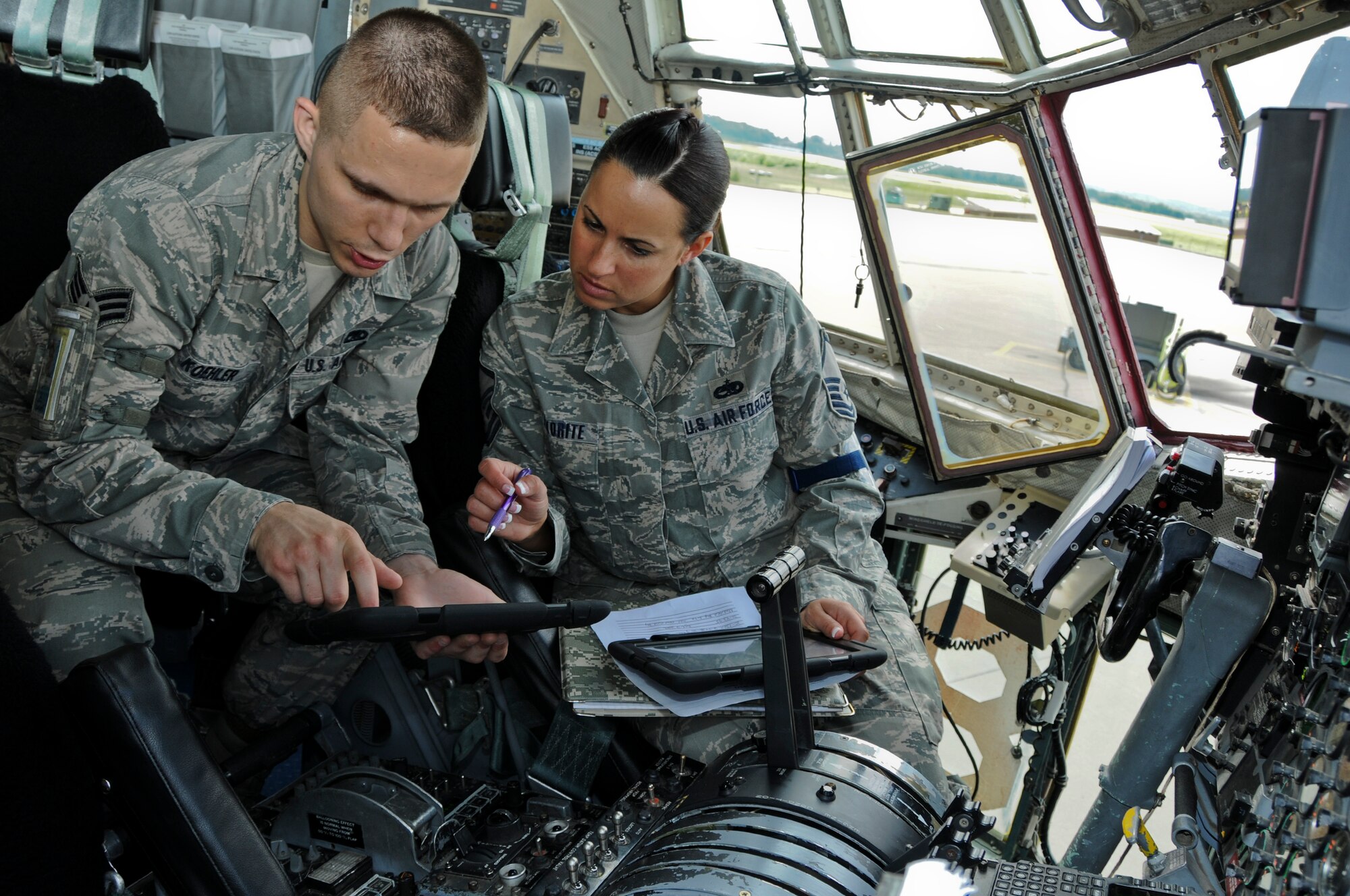 Master Sgt. Jessica Favorite, 911th Maintenance Squadron avionics quality assurance manager, and Senior Airman Stephen Koehler, 911 MXS communication navigation specialist, train on avionics pre-flight inspection procedures, June 2, 2013 at the Pittsburgh International Airport Air Reserve Station. (U.S. Air Force photo by Senior Airman Joshua J. Seybert)
