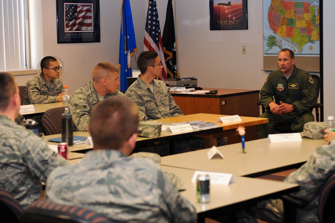 The 28th Bomb Wing Vice Commander Col. Gentry Boswell, talks with Airmen about the base’s mission, the community and similar topics during a First Term Airman Course in the Rushmore Center on Ellsworth Air Force Base, S.D., June 25, 2013. FTAC provides new Airmen with classes and information designed to help them adjust to life at their first duty station. (U.S. Air Force photo by Senior Airman Kate Maurer/Released)