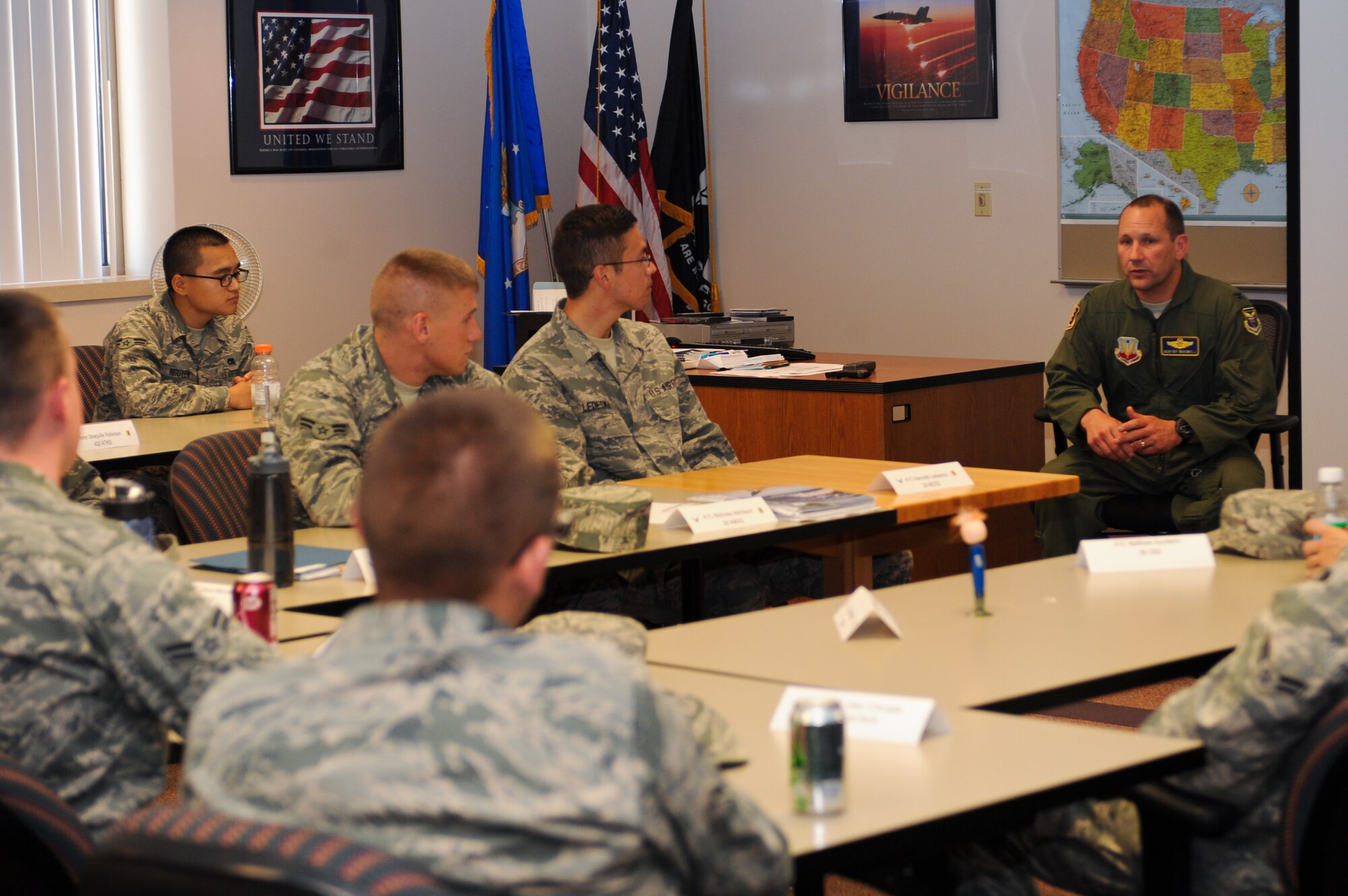 The 28th Bomb Wing Vice Commander Col. Gentry Boswell, talks with Airmen about the base’s mission, the community and similar topics during a First Term Airman Course in the Rushmore Center on Ellsworth Air Force Base, S.D., June 25, 2013. FTAC provides new Airmen with classes and information designed to help them adjust to life at their first duty station. (U.S. Air Force photo by Senior Airman Kate Maurer/Released)