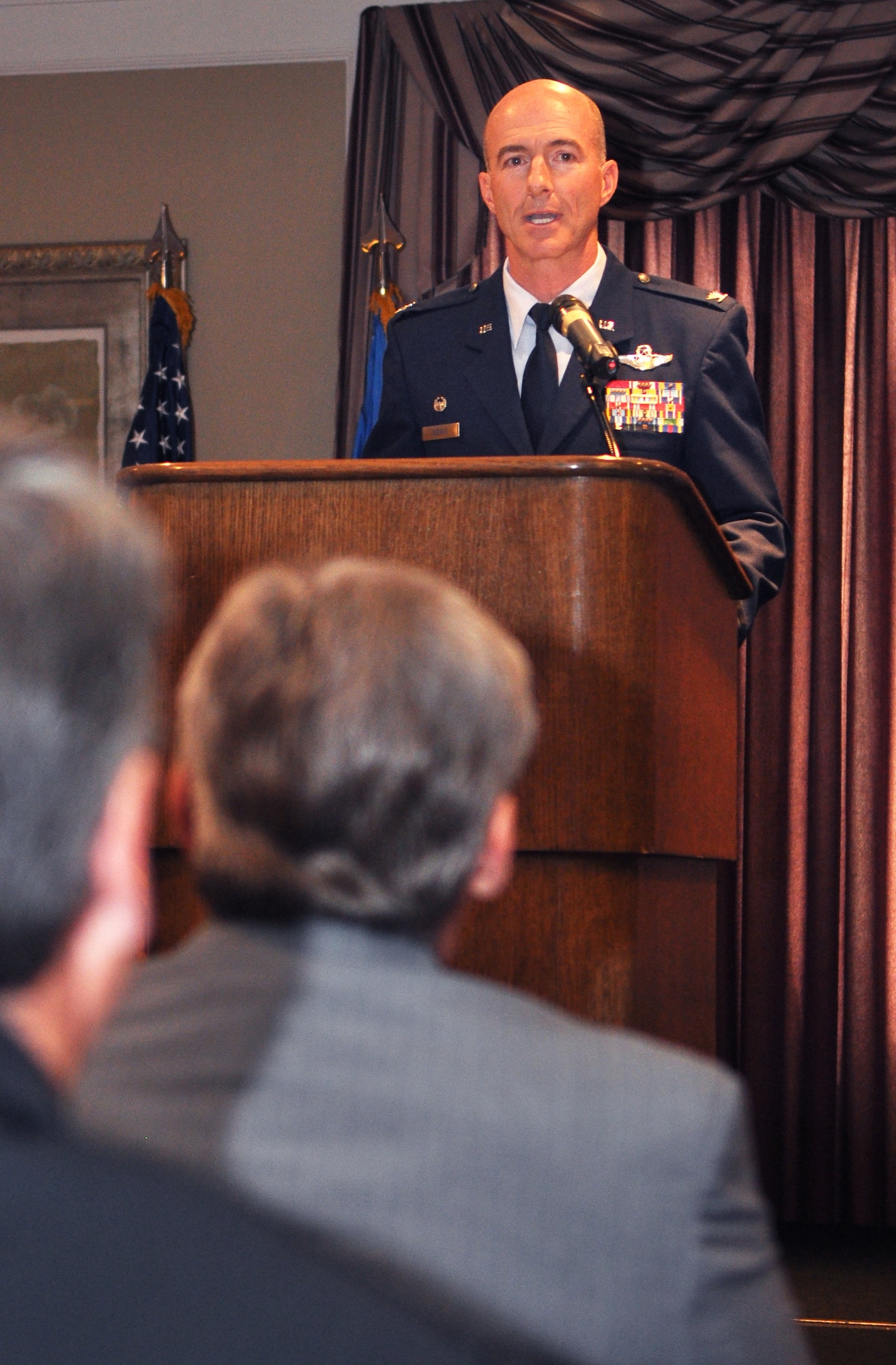 Col. Christopher Azzano speaks to members of the 72nd Air Base Wing after assuming command during a ceremony yesterday. Colonel Azzano, the former commander of the 412th Operations Group at Edwards AFB, Calif., replaces outgoing commander Col. Steven Bleymaier, who is set to become the deputy commander of Air Force Materiel Command Logistics. See story in next week’s issue. (Air Force photo by Micah Garbarino)