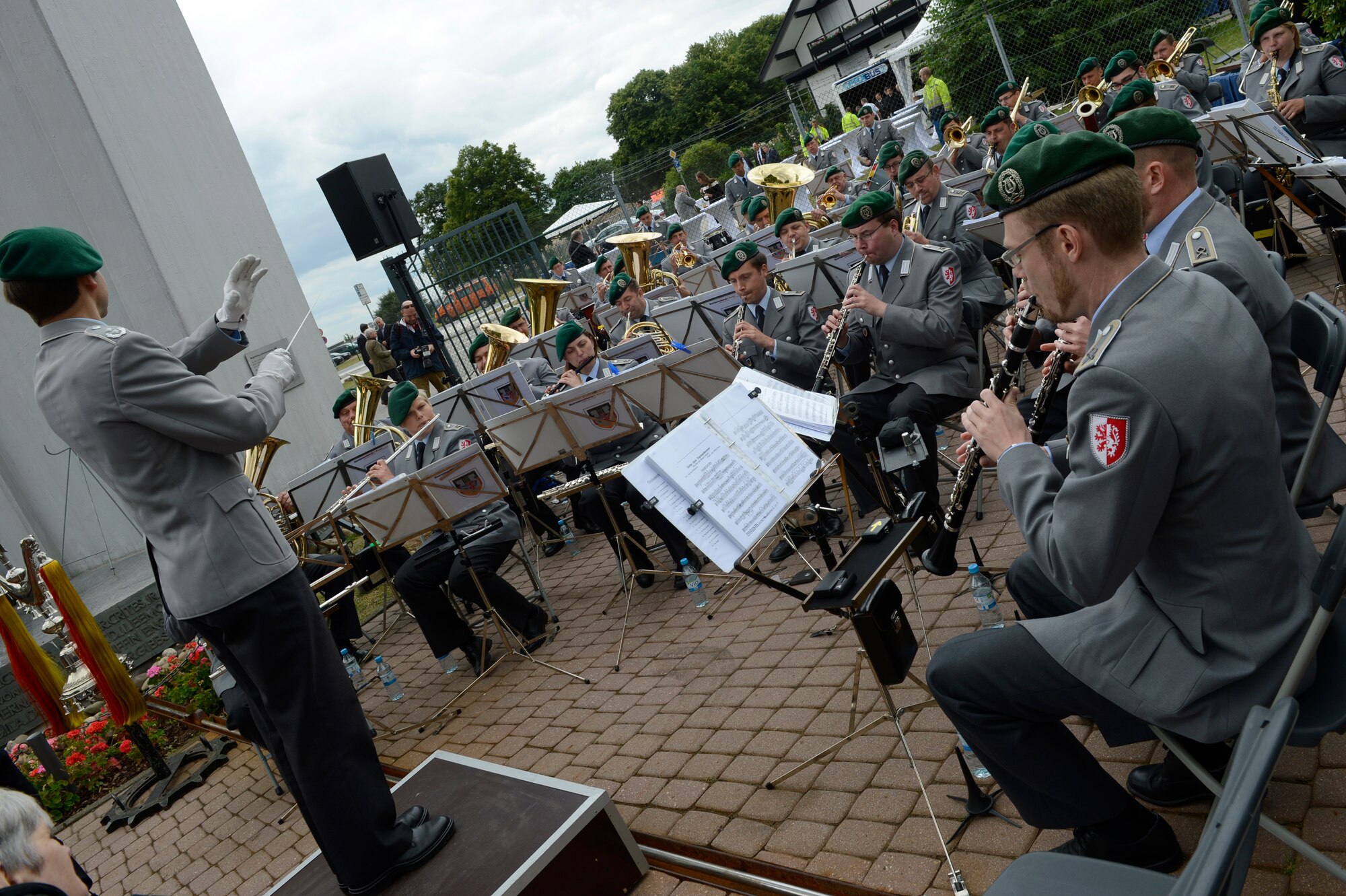 SPANGDAHLEM AIR BASE, Germany – The Bundeswehr Orchestra performs a musical piece during the 65th anniversary of the Berlin Airlift at the Berlin Airlift Memorial in Frankfurt, Germany June 26, 2013. During the event the orchestra played multiple songs including the German and U.S. national anthems. (U.S. Air Force photo by Staff Sgt. Christopher Ruano/Released)