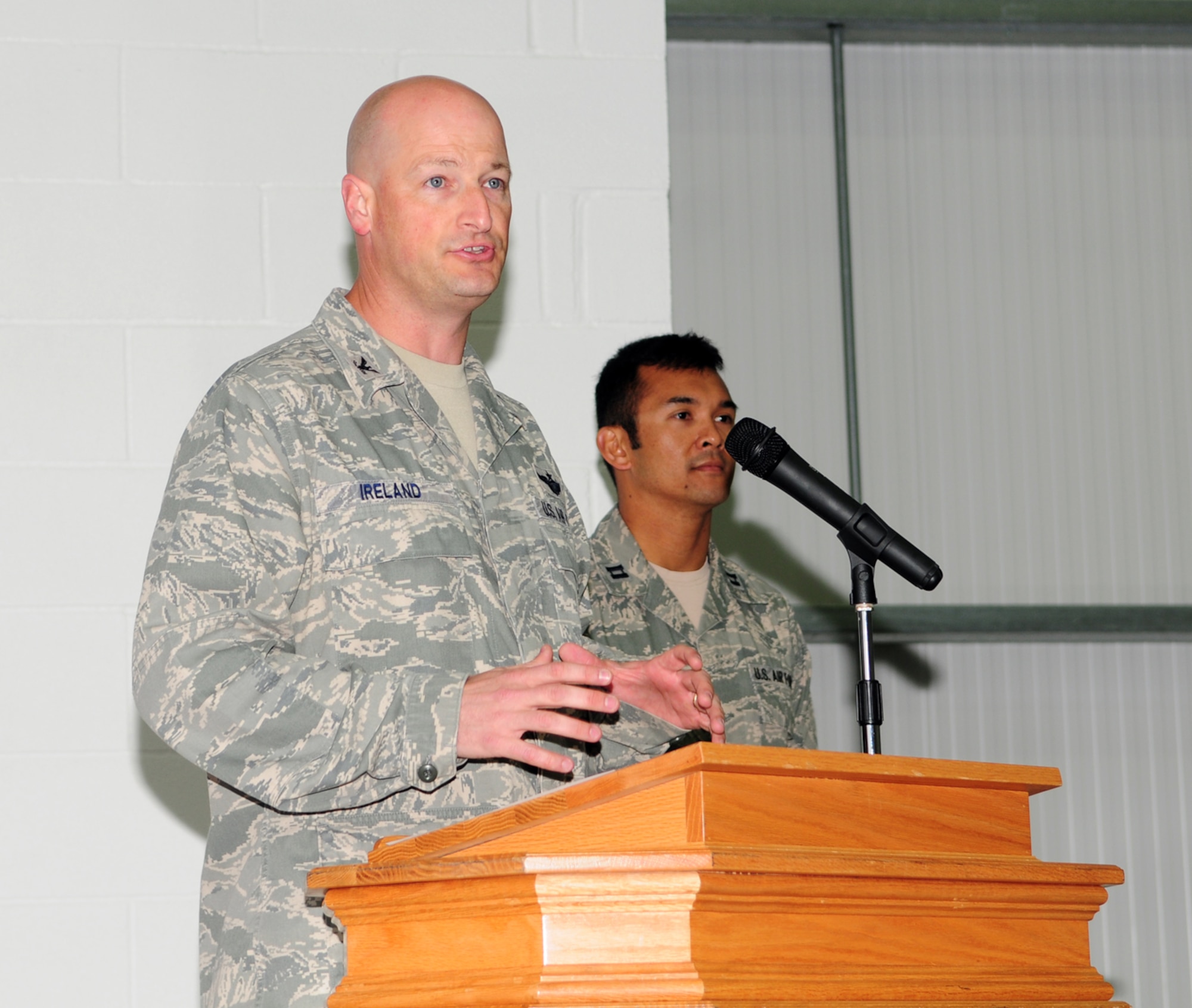 Col. Christopher Ireland, 352nd Special Operations Group commander, discusses how much effort went into getting the first “from-scratch” CV-22 Osprey simulator facility and how it is the result of a collaborative Team Mildenhall approach and mindset during the ribbon-cutting ceremony June 21, 2013, on RAF Mildenhall, England. Once in-place, the actual simulator will provide CV-22 pilots a vital training tool in gaining currency, proficiency and experience. (U.S. Air Force photo by Karen Abeyasekere/Released)