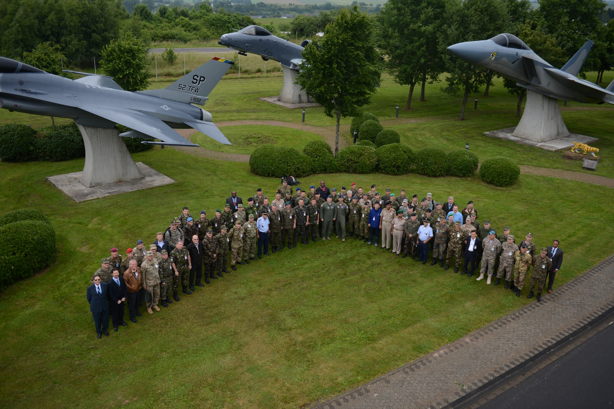 SPANGDAHLEM AIR BASE, Germany — Vienna Document 11 visit participants pose for a group photo June 27, 2013. The visit is part of the Vienna Document 11 agreement, which is a politically binding measure designed to enhance confidence and security among the participating nations. (U.S. Air Force photo by Airman 1st Class Gustavo Castillo/Released)