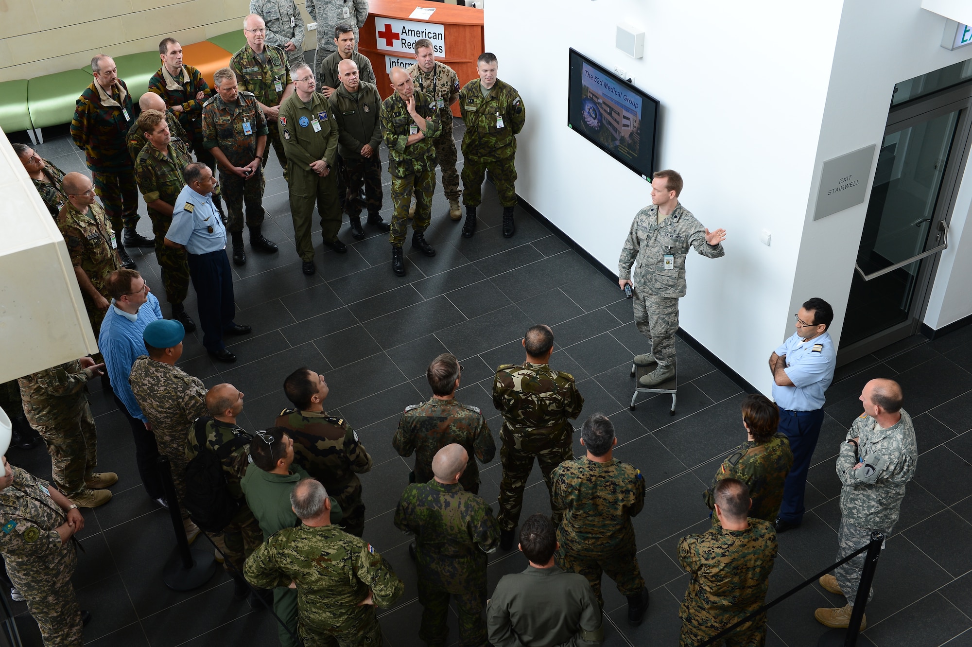 SPANGDAHLEM AIR BASE, Germany — U.S. Air Force Lt. Col. Bobby Christopher, 52nd Medical Support Squadron commander, briefs the capabilities of the 52nd Medical Group to attendees of the Vienna Document 11 visit June 27, 2013. More than 60 delegates from 34 nations visited Spangdahlem to gain an understanding of the daily maintenance and operations of a combat air base. (U.S. Air Force photo by Tech. Sgt. Jonathan Pomeroy/Released) 
