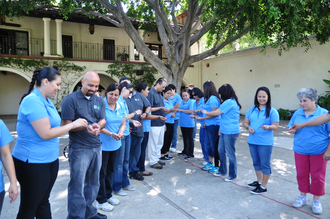 Teachers from among 20 schools in the Boyle Heights neighborhood of Los Angeles gathered the week of June 24 to learn techniques for incorporating hands-on activities related to science, technology, engineering and math. In this photo they are learning about how water flows within a watershed.  