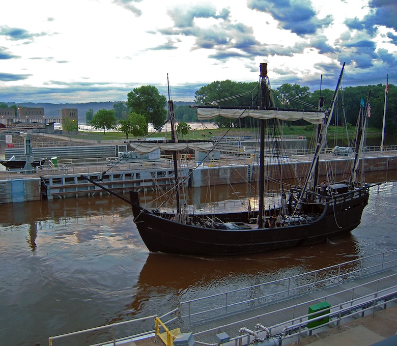 Replica ships of Christopher Columbus' exploration, the Nina and Pinta lock through Lock and Dam 3 in Welch, Minn., on the evening of June 27, 2013.