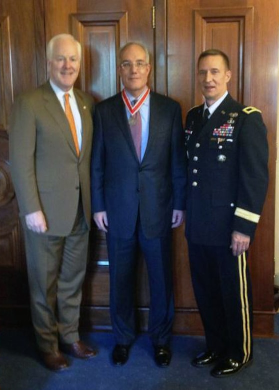 Ray Russo, center, acting director of Regional Business for the Southwestern Division, U.S. Army Corps of Engineers, was recently presented with a bronze de Fleury Medal by Sen. John Cornyn, R-Texas, left, and Brig. Gen. Thomas W. Kula, Southwestern Division commander.




