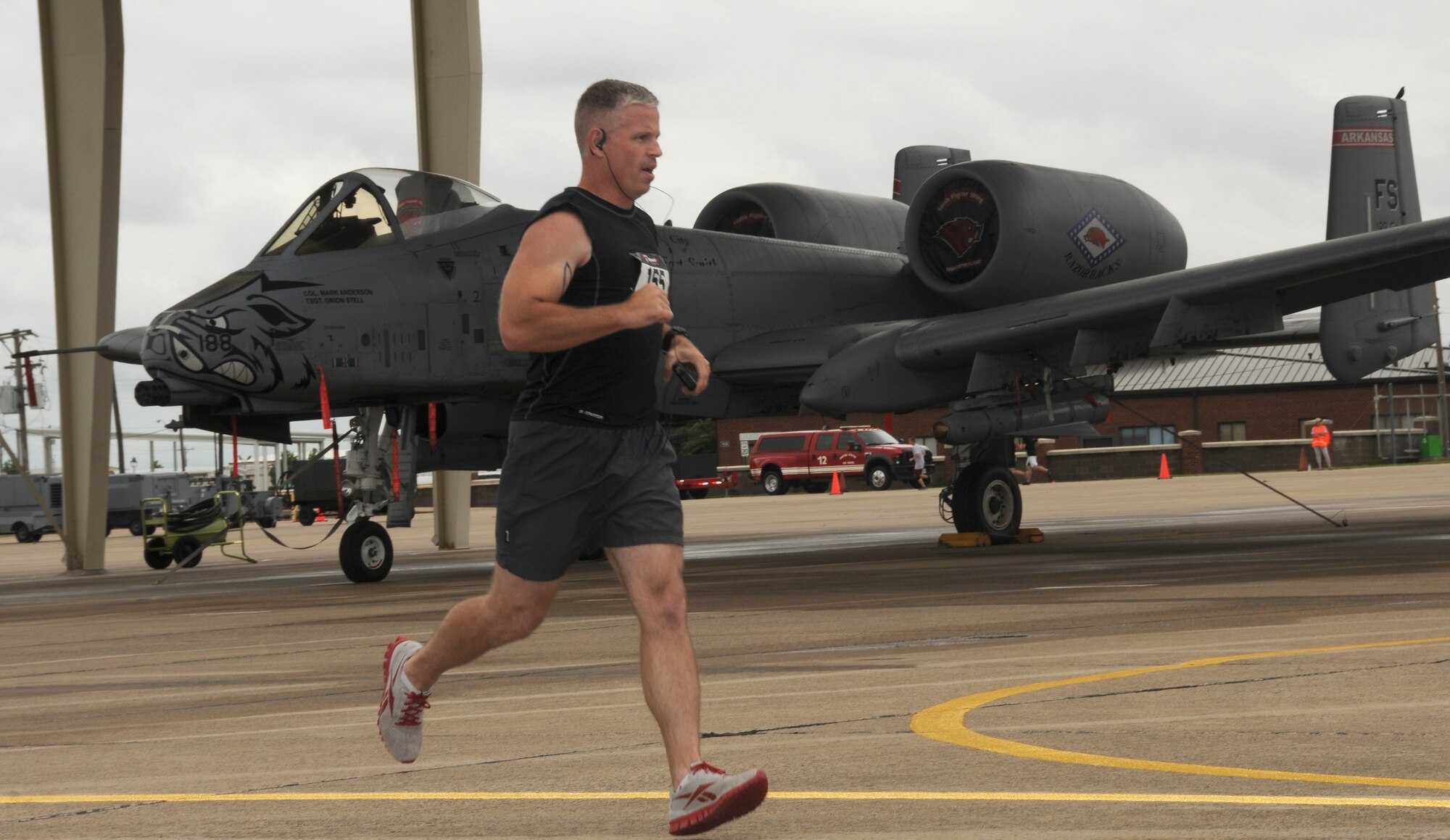 Tech. Sgt. Timothy Holland, a force protection specialist with the 188th Security Forces Squadron, runs in the 188th’s inaugural Hawg Jawg 5K run during Wingman Day at Ebbing Air National Guard Base, Fort Smith, Ark., June 1, 2013.Wingman Day activities included a Sexual Assault Prevention and Response training block, Hawg Jawg 5K and the four pillars of Airmen fitness: Physical, mental, spiritual and social. (U.S. Air National Guard photo by Senior Airman John Hillier/188th Fighter Wing Public Affairs)