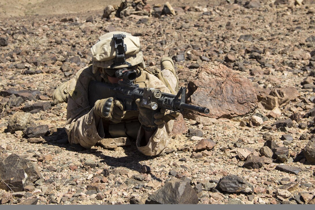 U.S. Marine Corps Lance Cpl. Cody J. Sandusky, a rifleman assigned to Company L, Battalion Landing Team 3/2, 26th Marine Expeditionary Unit (MEU), from New Orleans La., provides security during an ambush exercise in Al Quweira, Jordan, during Exercise Eager Lion 2013, June 16, 2013. Exercise Eager Lion 2013 is an annual, multinational exercise designed to strengthen military-to-military relationships and enhance security and stability in the region by responding to modern-day security scenarios. The 26th MEU is deployed to the 5th Fleet area of responsibility as part of the Kearsarge Amphibious Ready Group. The 26th MEU operates continuously across the globe, providing the president and unified combatant commanders with a forward-deployed, sea-based quick reaction force. (U.S. Marine Corps photo by Lance Cpl. Juanenrique Owings, 26th MEU Combat Camera/Not Released)