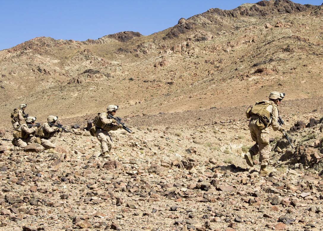 U.S. Marines assigned to Company L, Battalion Landing Team 3/2, 26th Marine Expeditionary Unit (MEU), conduct a squad ambush exercise in Al Quweira, Jordan, during Exercise Eager Lion 2013, June 16, 2013. Exercise Eager Lion 2013 is an annual, multinational exercise designed to strengthen military-to-military relationships and enhance security and stability in the region by responding to modern-day security scenarios. The 26th MEU is deployed to the 5th Fleet area of responsibility as part of the Kearsarge Amphibious Ready Group. The 26th MEU operates continuously across the globe, providing the president and unified combatant commanders with a forward-deployed, sea-based quick reaction force. (U.S. Marine Corps photo by Lance Cpl. Juanenrique Owings, 26th MEU Combat Camera/Not Released)