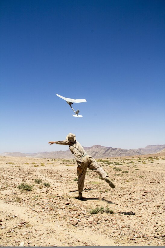 U.S. Marine Corps Lance Cpl. Kevin A. Stein, a rifleman assigned to Battalion Landing Team 3/2, 26th Marine Expeditionary Unit (MEU), from Seville, Ohio, launches a Raven B Unmanned Aerial Vehicle, during a platoon attack exercise, in Al Quweira, Jordan, during Exercise Eager Lion 2013, June 17, 2013. Exercise Eager Lion 2013 is an annual, multinational exercise designed to strengthen military-to-military relationships and enhance security and stability in the region by responding to modern-day security scenarios. The 26th MEU is deployed to the 5th Fleet area of responsibility as part of the Kearsarge Amphibious Ready Group. The 26th MEU operates continuously across the globe, providing the president and unified combatant commanders with a forward-deployed, sea-based quick reaction force. (U.S. Marine Corps photo by Lance Cpl. Juanenrique Owings, 26th MEU Combat Camera/Not Released)