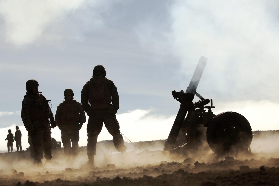 POHAKULOA TRAINING AREA, Hawaii - A field artilleryman with Alpha Battery, 1st Battalion, 12th Marine Regiment, pulls the lanyard on a M327 120 mm mortar system during Operation Spartan Fury at Pohakuloa Training Area, Hawaii, Feb. 21, 2013. The Alpha Battery Marines used the mortar system for the first time during the training exercise and were mentored by Marines from Bravo Battery to become familiar with the new weaponry.(U.S. Marine Corps photo by Lance Cpl. Nathan Knapke)