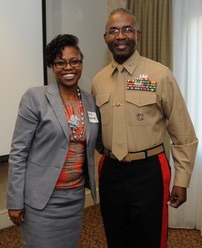 CHARLOTTE, N.C.— Major General Ronald L. Bailey, commanding general of 1st Marine Division, poses with Jacqui Carpenter, commissioner of The Central Intercollegiate Athletic Association (CIAA) during the Once a Marine Always a Marine gathering in Charlotte, N.C., Feb. 28, 2013. The gathering was one of the many events benefitting the community during the week of the Central Intercollegiate Athletic Association’s Basketball Tournament. 
The CIAA was founded in 1912 as the Colored Intercollegiate Athletic Association, and is the oldest African-American athletic conference in the Nation. The CIAA is touted as being the third most attended basketball tournament among all NCAA divisions, and consists of Historically Black Colleges and Universities (HBCU) spanning the East Coast from Pennsylvania to North Carolina. The 2013 CIAA Tournament is expected to bring about 190,000 fans to Charlotte, N.C., during the course of the week with an economic impact exceeding $40 million. Marines from across the Nation were brought to Charlotte during the 2013 CIAA tournament to raise awareness of the Marine Corps' Officer programs to the participants and attendees of the tournament as a viable option for college graduates after they transition from college to professional life.
