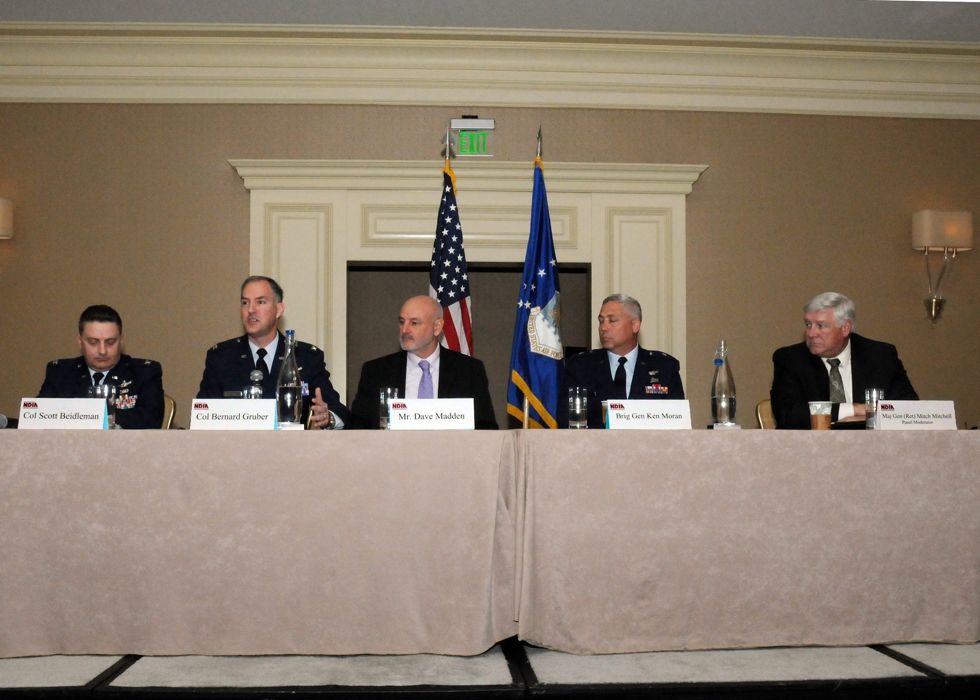 Senior Space and Missile Systems Center leaders participate in a panel discussion about Maintaining America’s Space Advantage at the National Defense Industrial Association’s Acquisition Forum held in Marina Del Rey, Calif., Feb. 22.  Pictured from left to right are: Col. Scott Beidleman, Developmental Planning director; Col. Bernard Gruber, Global Positioning Systems director; Dave Madden, SMC executive director, Brig. Gen. Ken Moran, Program Management and Integration director; and Mitch Mitchell, The Aerospace Corporation vice president of Program Assessments. (Photo by Jim Gordon)