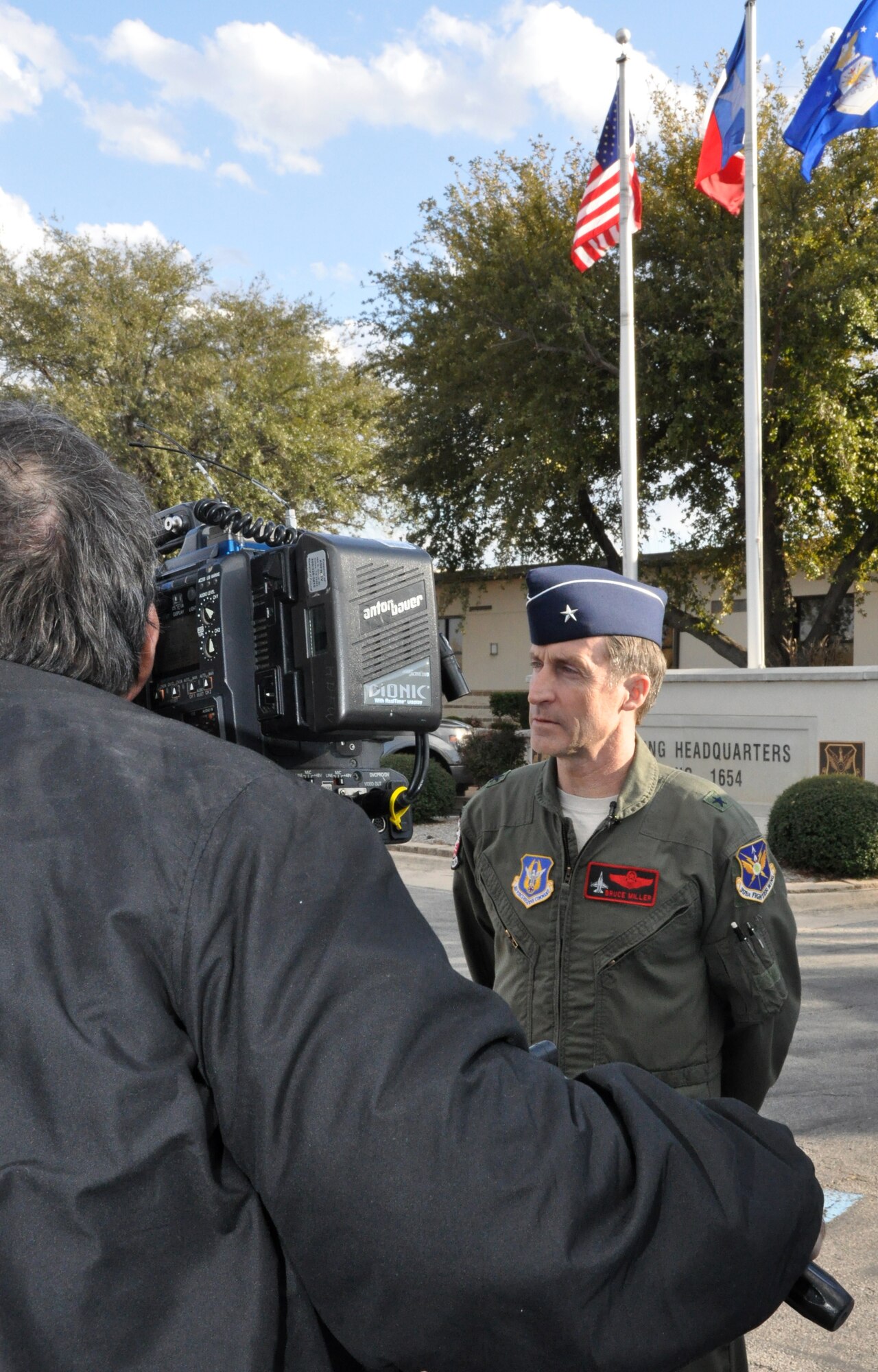 Brig. Gen. Bruce Miller, 301st Fighter Wing commander, spoke with local television Fox 4 reporter, Brandon Todd, today concerning his questions on the flyovers being cut due to the latest budget constraints. General Miller reiterated that all flyovers normally performed by units such as the 301st at sporting events and other outdoor ceremonies approved by the Secretary of the Air Force will not occur because of a purposed reduction in flying hours of up to 18 percent. (U.S. Air Force photo/Master Sgt. Julie Briden-Garcia)