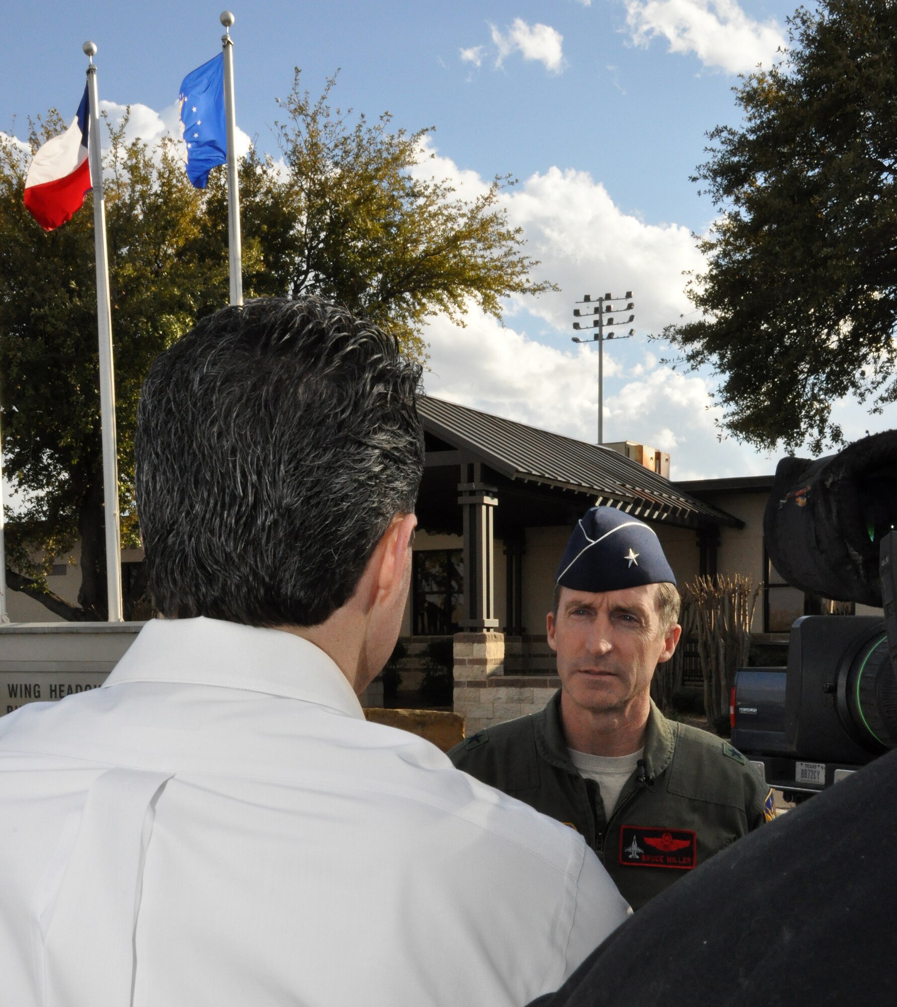 Brig. Gen. Bruce Miller, 301st Fighter Wing commander, spoke with local television Fox 4 reporter, Brandon Todd, today concerning his questions on the flyovers being cut due to the latest budget constraints. General Miller reiterated that all flyovers normally performed by units such as the 301st at sporting events and other outdoor ceremonies approved by the Secretary of the Air Force will not occur because of a purposed reduction in flying hours of up to 18 percent. (U.S. Air Force photo/Master Sgt. Julie Briden-Garcia)