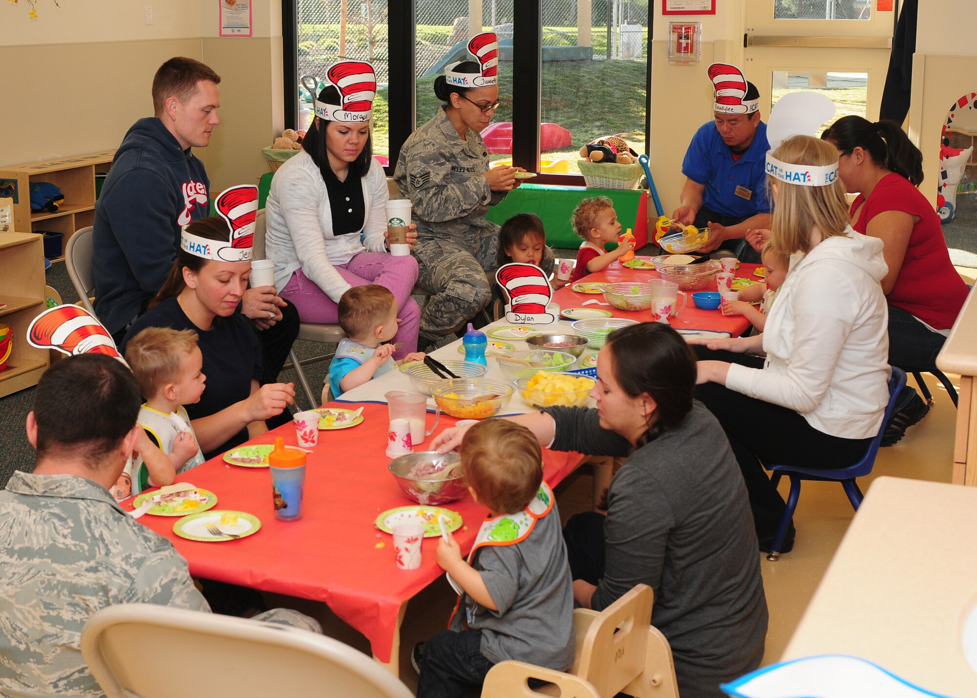 The Child Development Center staff celebrates Dr. Seuss's birthday by hosting a Green Eggs and Ham breakfast at the CDC on Beale Air Force Base Calif., March 1, 2013. Dr. Seuss published 46 children's books including the bestselling "Green Eggs and Ham" and "The Cat in the Hat." (U.S. Air Force photo by Senior Airman Allen Pollard/Released)