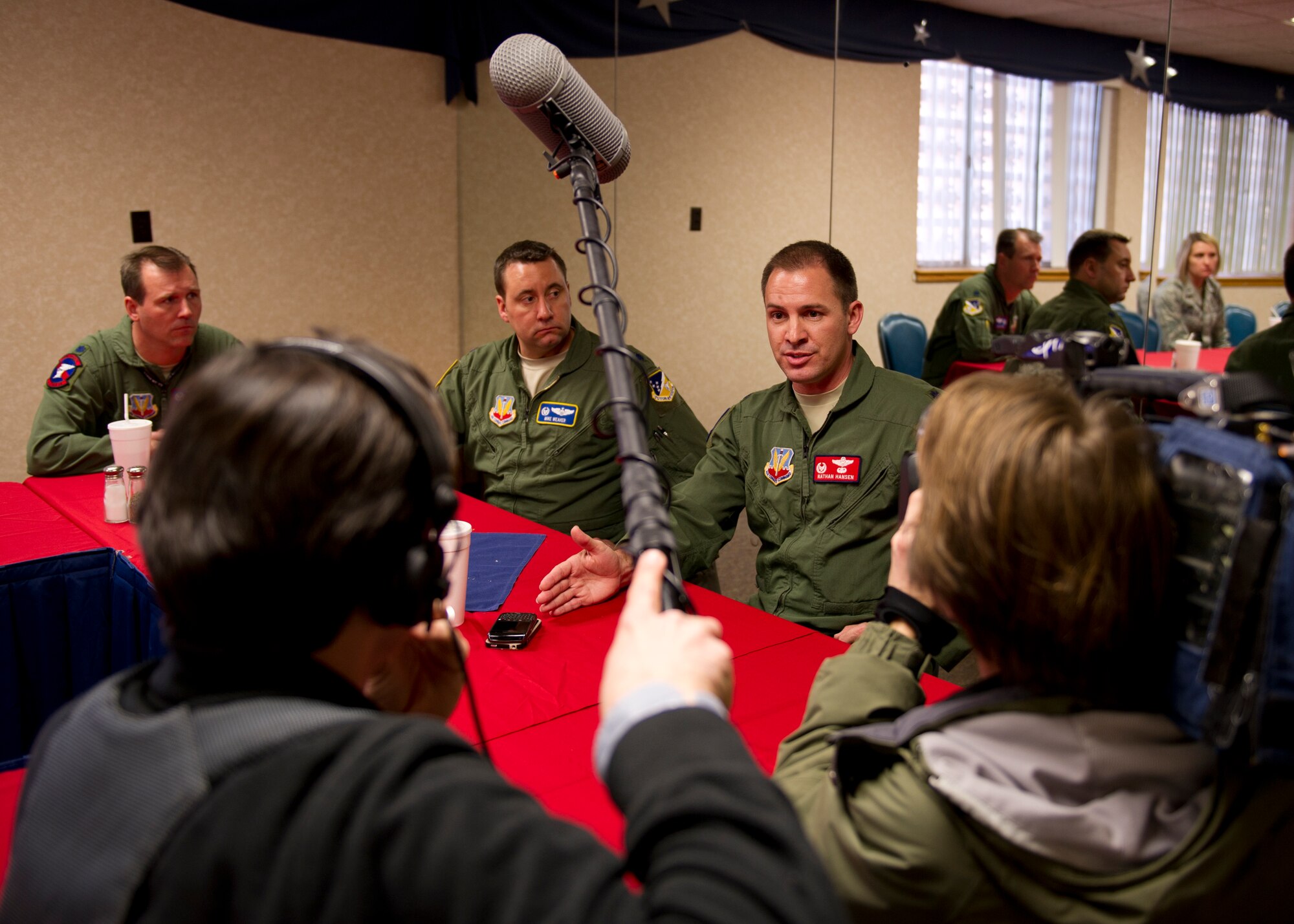 Lt. Col. Nathan Hansen, 29th Attack Squadron commander, talks about the MQ-1 Predators’ and MQ-9 Reapers’ capabilities to local and international media during a media day at Holloman Air Force Base, N.M., Feb. 28. Media days are scheduled once every quarter, with the next one tentatively scheduled for late June. (U.S. Air Force photo by Senior Airman Kasey Close/Released)