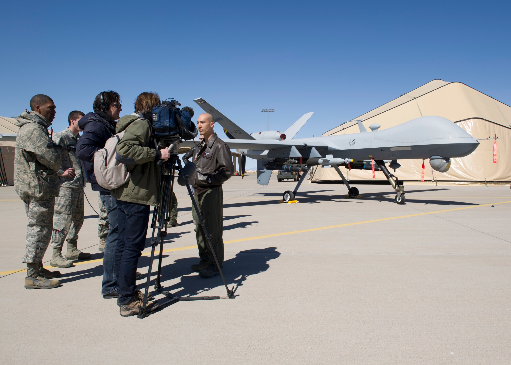 Capt. Andy (last name omitted due to operational security concerns), 9th Attack Squadron MQ-9 Reaper instructor pilot, answers questions from international media about the MQ-9 during a media day at Holloman Air Force Base, N.M., Feb. 28. Media days are scheduled once every quarter, with the next one tentatively scheduled for late June. (U.S. Air Force photo by Senior Airman Kasey Close/Released)