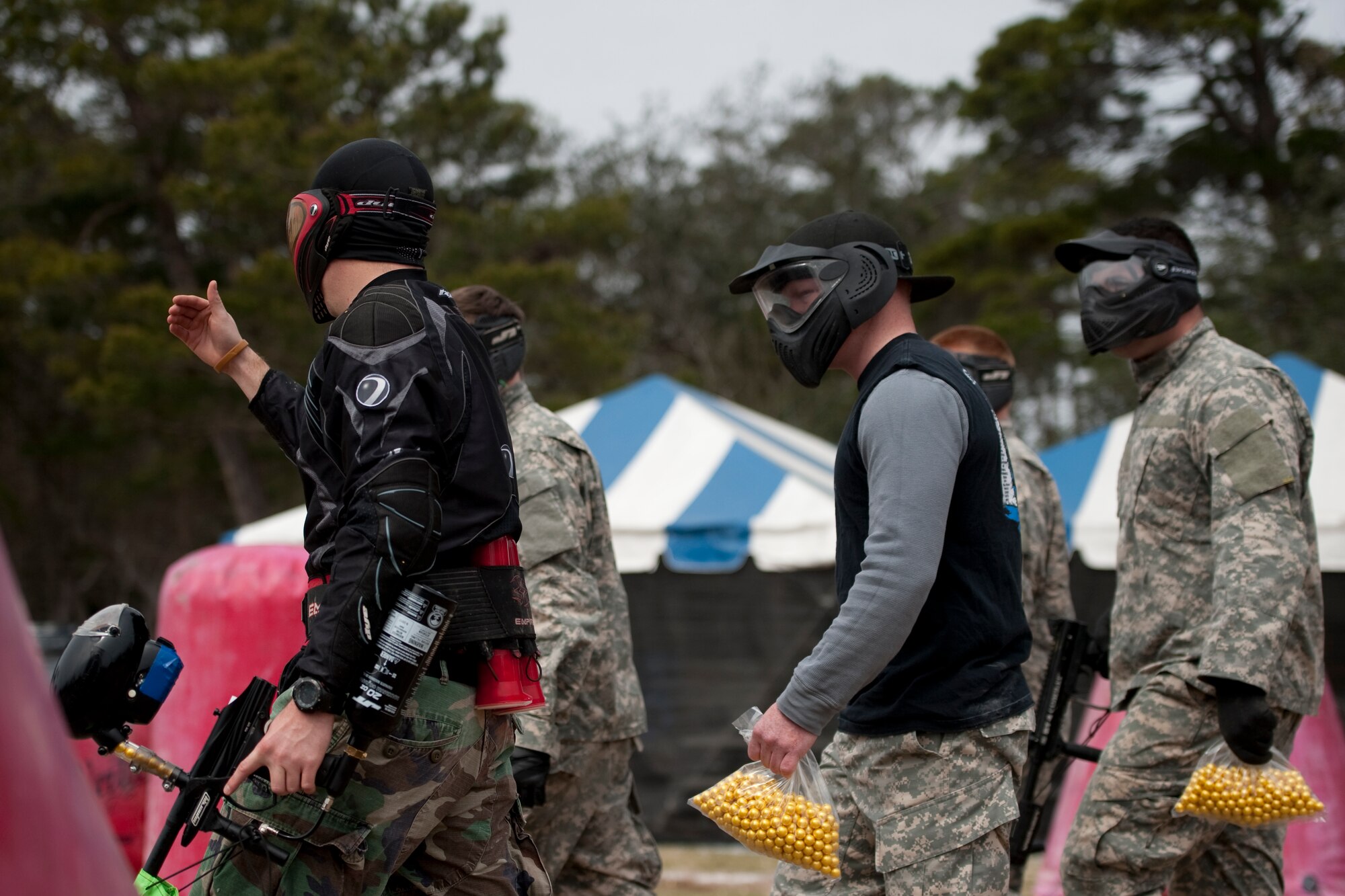 Members of Hurlburt Field and the 7th Special Forces Group participate in an afternoon of free paintball at Hurlburt Field, Fla., March 1, 2013.  The event encouraged camaraderie amongst participants from both branches of the military. (U.S. Air Force Photo/Airman 1st Class Naomi M. Griego)