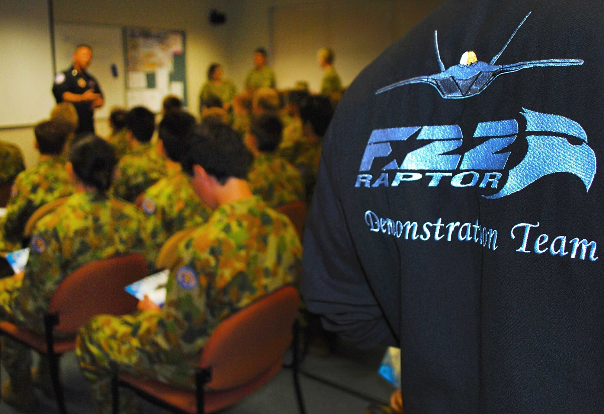 F-22 Raptor demonstration team members, from Langley Air Base, Virginia, visit with Army cadets from the Victoria Brigade on Feb. 28, 2013, at the Monash Barracks, Dandenong South, Australia. The F-22 Raptor demonstration team is performing at the Australian International Airshow 2013, which is one of the largest, biennial international trade shows in the Pacific. Approximately 220 U.S. service members along with the U.S. Air Force's F-22 Raptor, C-17 Globemaster III, F-16 Fighting Falcon, B-52 Stratofortress, and KC-135 Stratotanker are supporting AIA 2013, which allows a unique opportunity for the United States to showcase its aviation prowess and strengthen military-to-military ties with our Pacific allies and partners. (U.S. Air Force photo by Capt. Natassia Cherne)