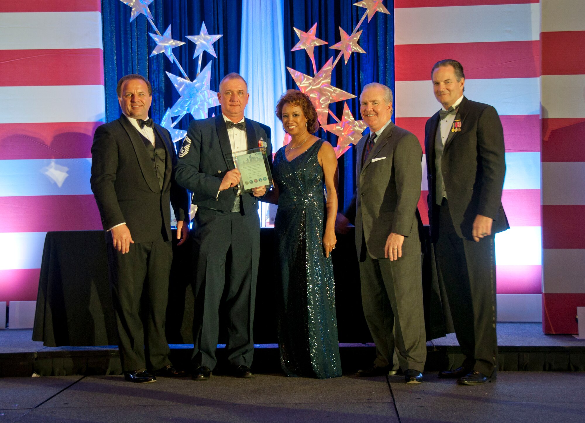 TAMPA, Fla. – Citizen-Airmen swept the reserve awards at the 2013 Military Appreciation Banquet.  From left to right is Chase Stockton of Panther International, Inc., Senior Master Sgt. Tom Lehmann, a superintendent with the 927th Air Refueling Wing who received the Reserve Non-Commissioned Officer of the Year award, Lt. Governor Jennifer Carroll, Tampa Mayor Bob Buckhorn and Jon Bayless, vice president of business development with Tandem Systems. (Official U.S. Air Force photo/Staff Sgt. Shawn Rhodes)

