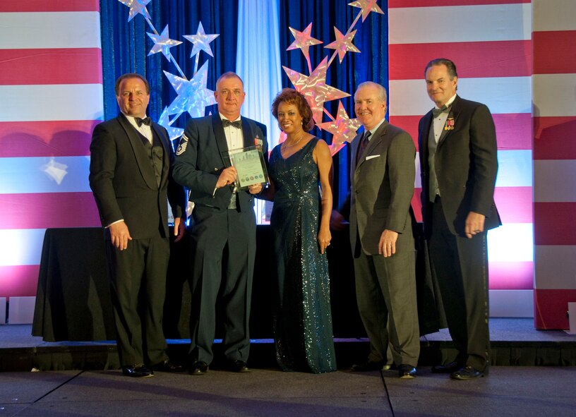 TAMPA, Fla. – Citizen-Airmen swept the reserve awards at the 2013 Military Appreciation Banquet.  From left to right is Chase Stockton of Panther International, Inc., Senior Master Sgt. Tom Lehmann, a superintendent with the 927th Air Refueling Wing who received the Reserve Non-Commissioned Officer of the Year award, Lt. Governor Jennifer Carroll, Tampa Mayor Bob Buckhorn and Jon Bayless, vice president of business development with Tandem Systems. (Official U.S. Air Force photo/Staff Sgt. Shawn Rhodes)

