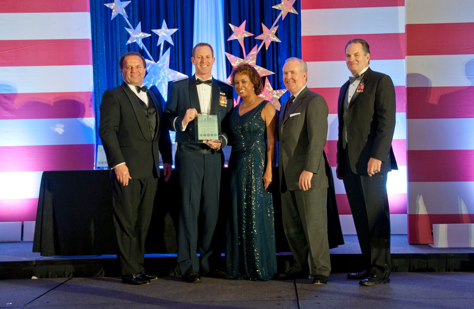 TAMPA, Fla. – Citizen-Airmen swept the reserve awards at the 2013 Military Appreciation Banquet.  From left to right is Chase Stockton of Panther International, Inc., Maj. Zach Davidson, a pilot with the 927th Air Refueling Wing who received the Reserve Officer of the Year award, Lt. Governor Jennifer Carroll, Tampa Mayor Bob Buckhorn and Jon Bayless, vice president of business development with Tandem Systems. (Official U.S. Air Force photo/Staff Sgt. Shawn Rhodes)