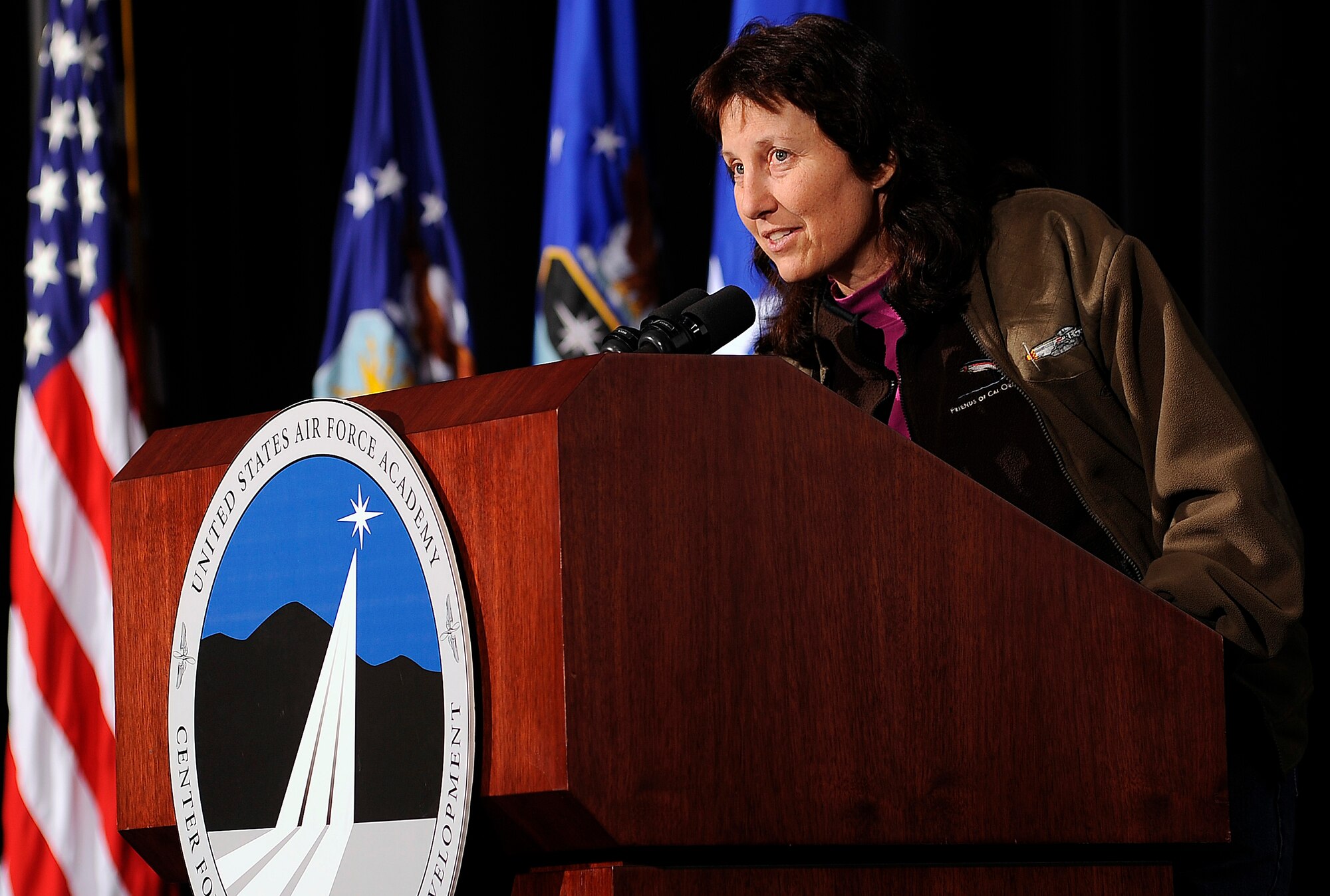 Victoria Yeager introduces her husband, retired Brig. Gen. Chuck Yeager, during a National Character and Leadership Symposium presentation at the Air Force Academy Feb. 22, 2013. The symposium is designed to give cadets testimonials on how character and leadership has helped guest speakers' lives. (U.S. Air Force photo/Mike Kaplan)