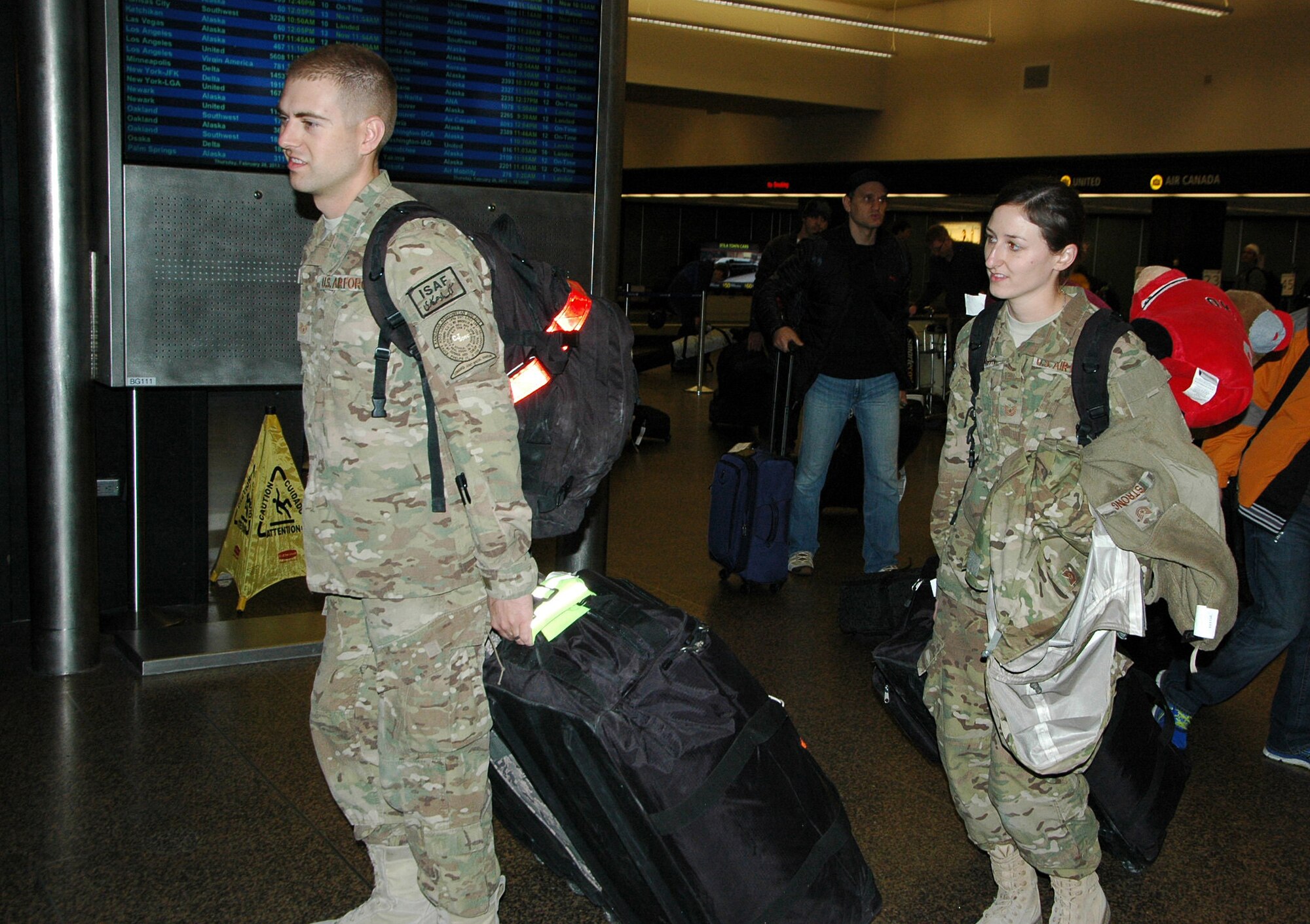 Staff Sgt. David Strong and Tech. Sgt. Whitney Strong, 86th Aerial Port Squadron, were among the 13 Reserve Airmen who returned from Afghanistan Feb. 28. (U.S. Air Force photo by Sandra Pishner)