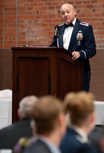 Col. Christopher Coffelt, 90th Missile Wing commander, speaks at the annual 90th Missile Wing awards banquet in the Fall Hall Community Center Feb. 22. (U.S. Air Force photo by R.J. Oriez)