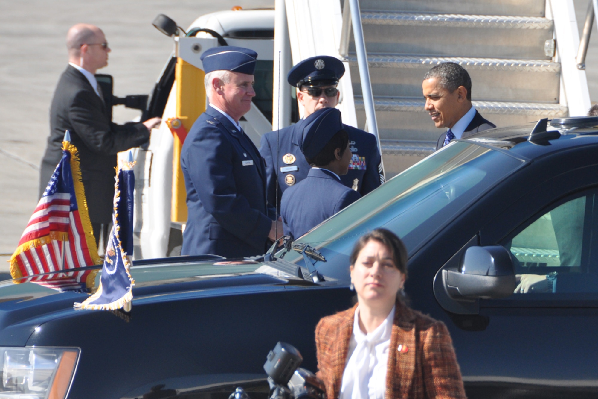 Col. Steven R. Clayton, 94th Operations Group commander and Senior Airman Tumyra D. Byron, knowledge management specialist, greet President Barack Obama during his visit to Dobbins Air Reserve Base, Feb. 14. The president was en-route to the City of Decatur Recreation Center to discuss proposals outlined in his recent state of the union address. Bryon received a President’s Coin from Obama during the visit. (U.S.Air Force photo/James Branch)