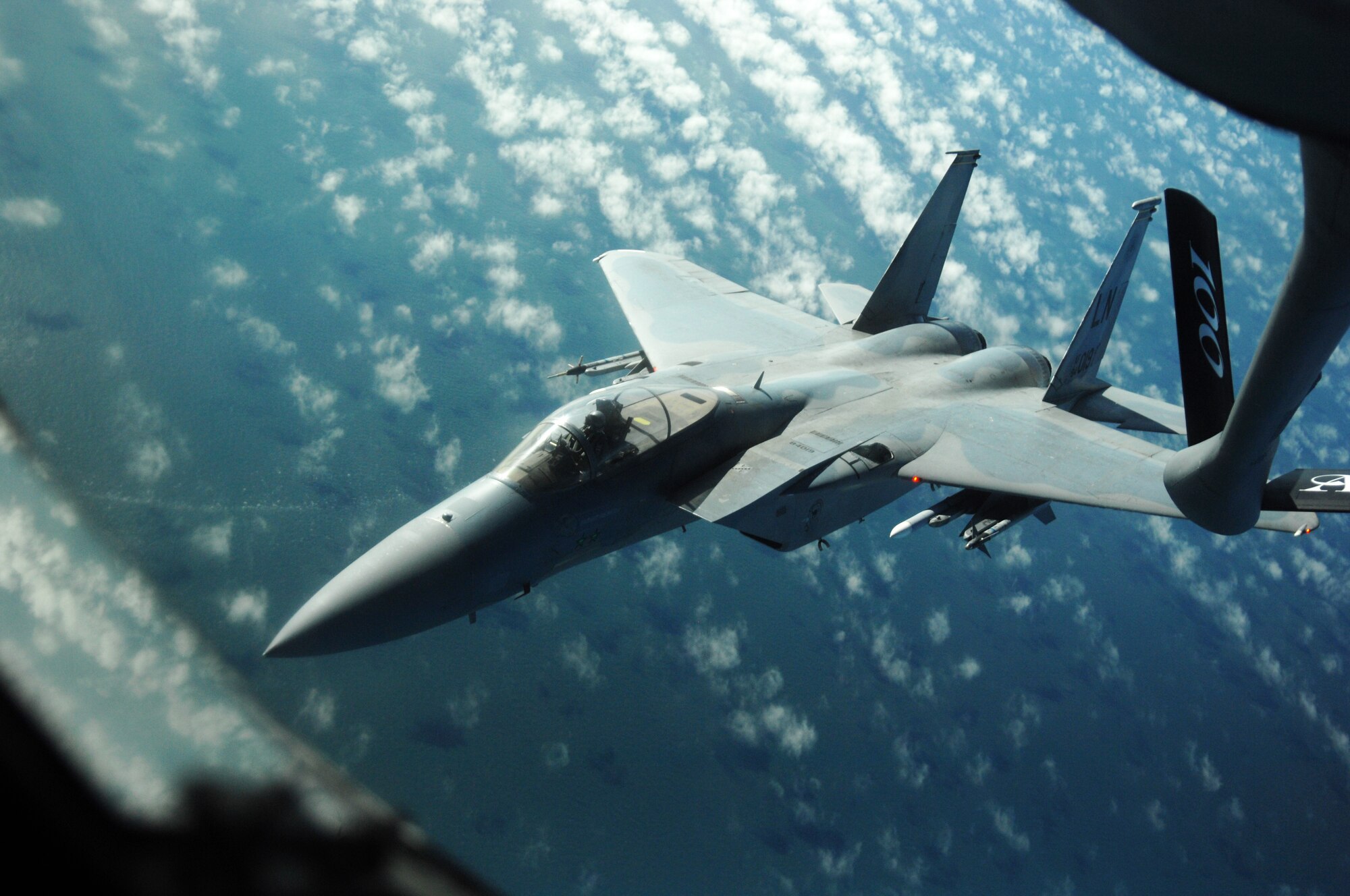 An F-15C Eagle pilot from RAF Lakenheath, England, separates and banks right after refueling from a KC-135R Stratotanker from RAF Mildenhall, England, during an exercise Feb. 27, 2013, over the northern coast of Norfolk, England. Refueling exercises keep pilots and boom operators prepared to perform their job in a real-world operation. (U.S. Air Force photo by Airman 1st Class Dillon Johnston/Released)
