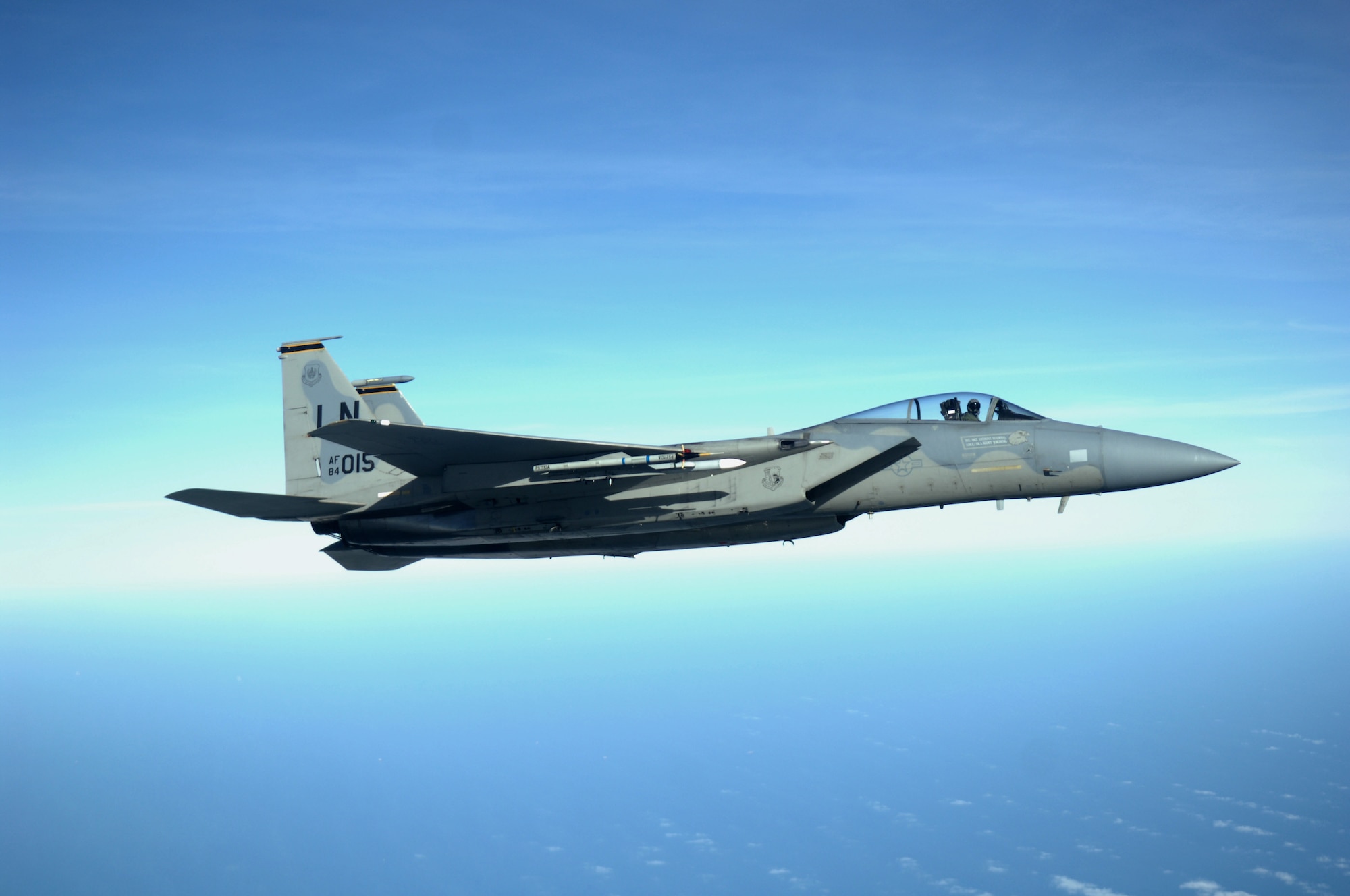 An F-15C Eagle from RAF Lakenheath, England, flies alongside a KC-135R Stratotanker, from RAF Mildenhall, England, Feb. 27, 2013, during a refueling exercise over the northern coast of Norfolk, England. Eight F15-C aircraft participated in the exercise. (U.S. Air Force photo by Airman 1st Class Dillon Johnston/Released)