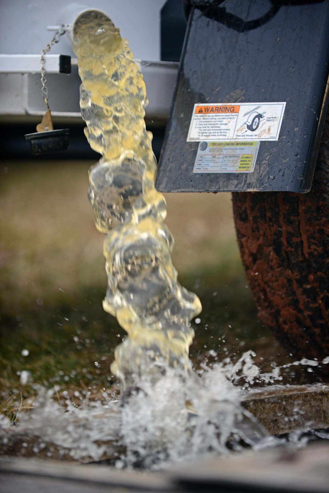 Waste water is emptied from a Trav-L-Vac 300 into an oil-water separator Feb. 14, 2013, at Aviano Air Base, Italy. Once a week, at least two crew members provide upkeep on the septic tanks or grease traps that need to be emptied. (U.S. Air Force photo/Airman 1st Class Matthew Lotz)