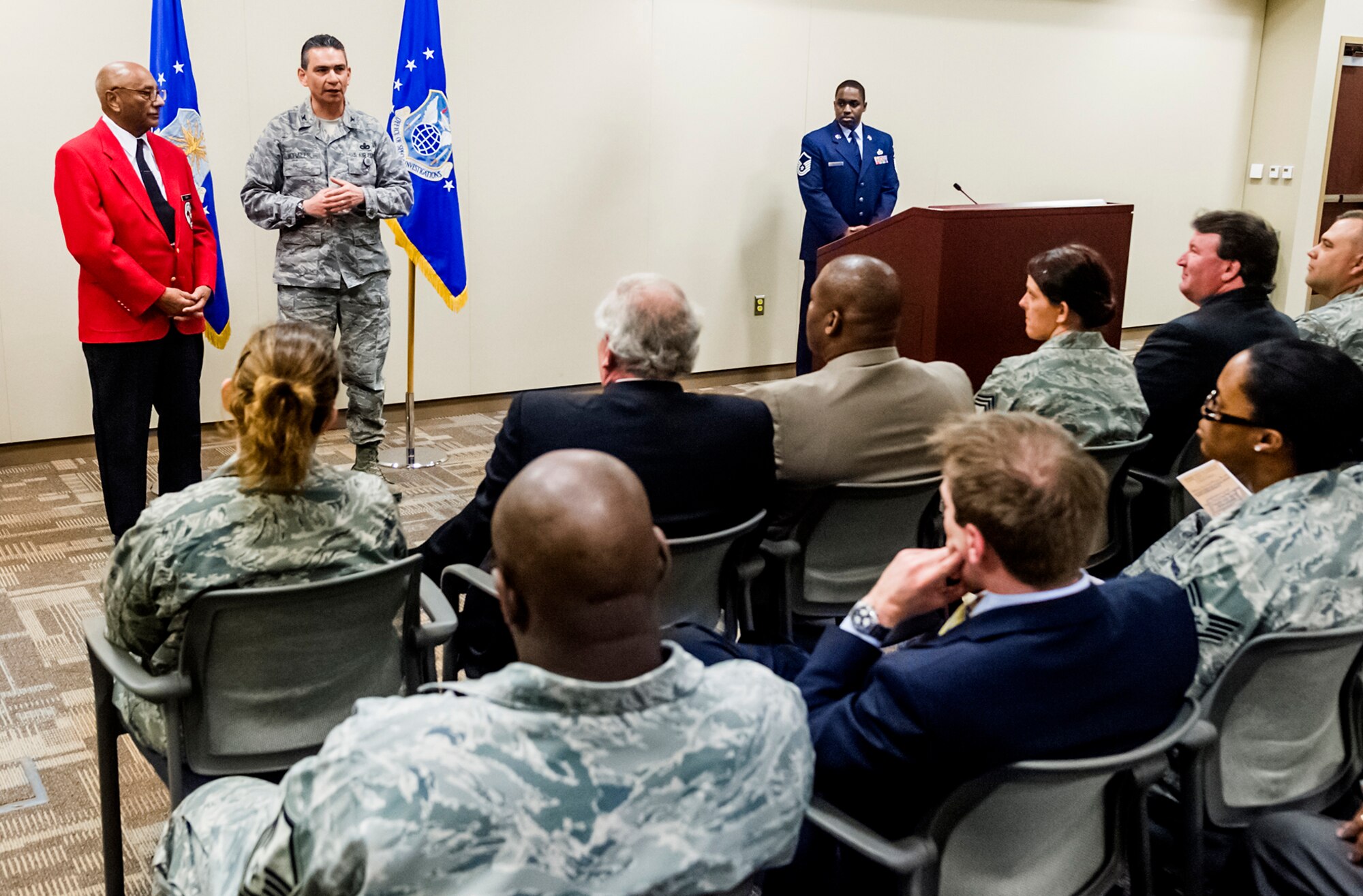 OSI had the honor of hosting a former Tuskegee Airman at OSI Headquarters, Quantico, Va., Feb. 27. Dr. Ivan Ware spent some time with OSI Airmen discussing what it was like to serve as a Tuskegee Airman in the 1940s. He retired as a lieutenant colonel from the Air Force after 30 years of service. Ware also received a tour of the OSI headquarters building as part of his visit. He is pictured on the left with Col. Humberto Morales, OSI vice commander. (U.S. Air Force photo/Mr. Mike Hastings)