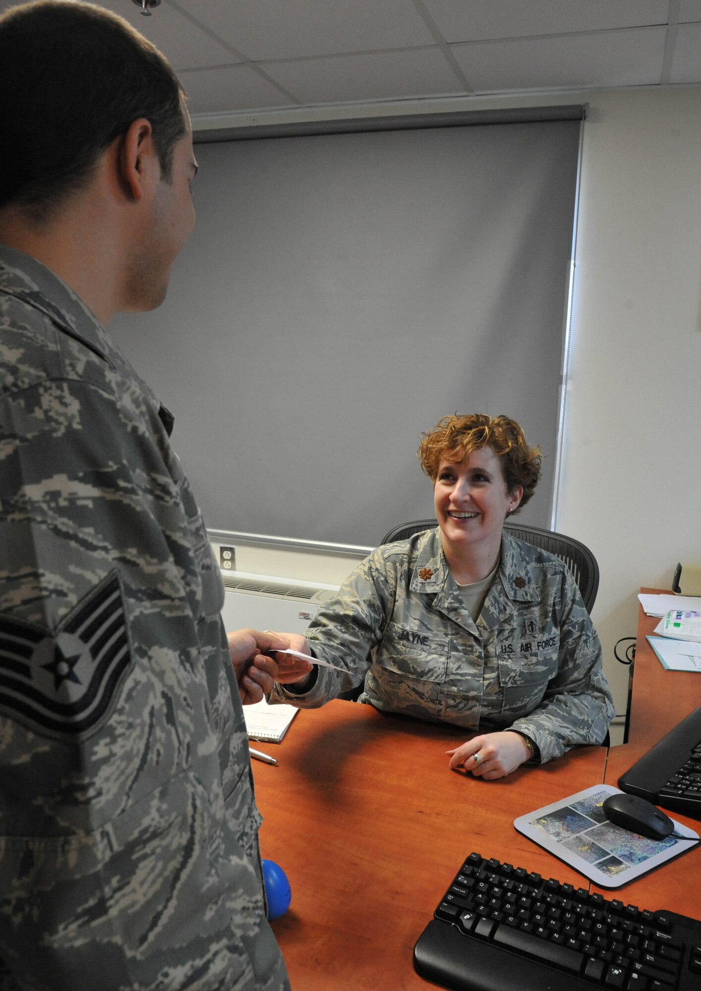 Maj. Tara Jayne, 65th Medical Operations Squadron optometrist, was awarded the 2012 Armed Forces Optometric Society Junior Officer of the Year. (Photo by Guido Melo)