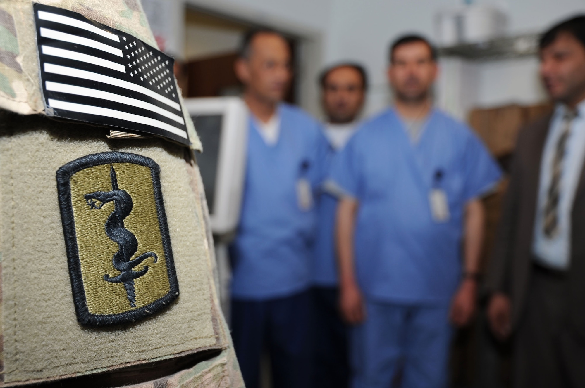 Participants in the Afghan Trauma Mentorship Program take a tour of the Craig Joint Theater Hospital laboratory on Bagram Airfield, Afghanistan, Feb. 16, 2013. The program invites Afghan doctors and nurses to learn about the latest medical techniques and equipment. (U.S. Air Force photo/Staff Sgt. David Dobrydney)