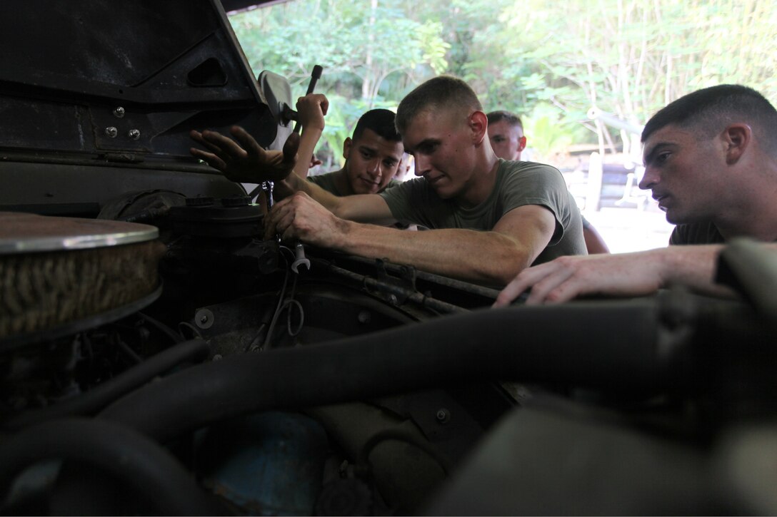 Marines with Combat Logistics Detachment 39, 3rd Marine Logistics Group, restore vintage Marine Corps vehicles on Feb. 27 at the Pacific War Museum. The Marines were restoring the vehicles as training during exercise Guahan Shield, an exercise designed to facilitate multiservice engagement and provide potential rapid response to theater crises and contingency operations in the Asia-Pacific region.


