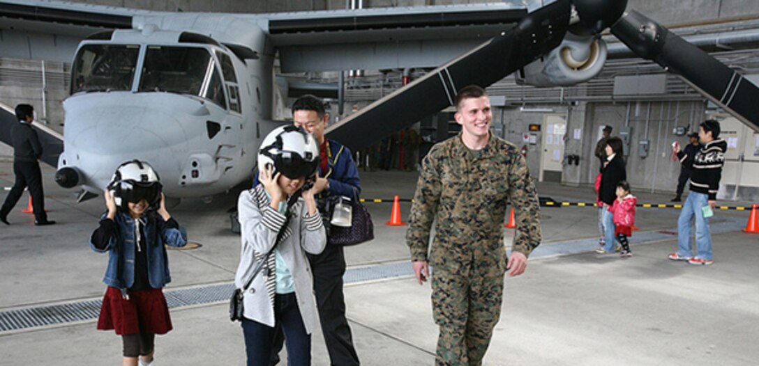 III Marine Expeditionary Force and Marine Corps Installations Pacific hosted an MV-22 Osprey Family Day March 3 at MCAS Futenma for Okinawa citizens. More than 300 parents with their children attended the event. The families received information about the MV-22 Osprey's capabilities, toured the aircraft, took photos, and asked questions about the Osprey to pilots and other air crew personnel.
